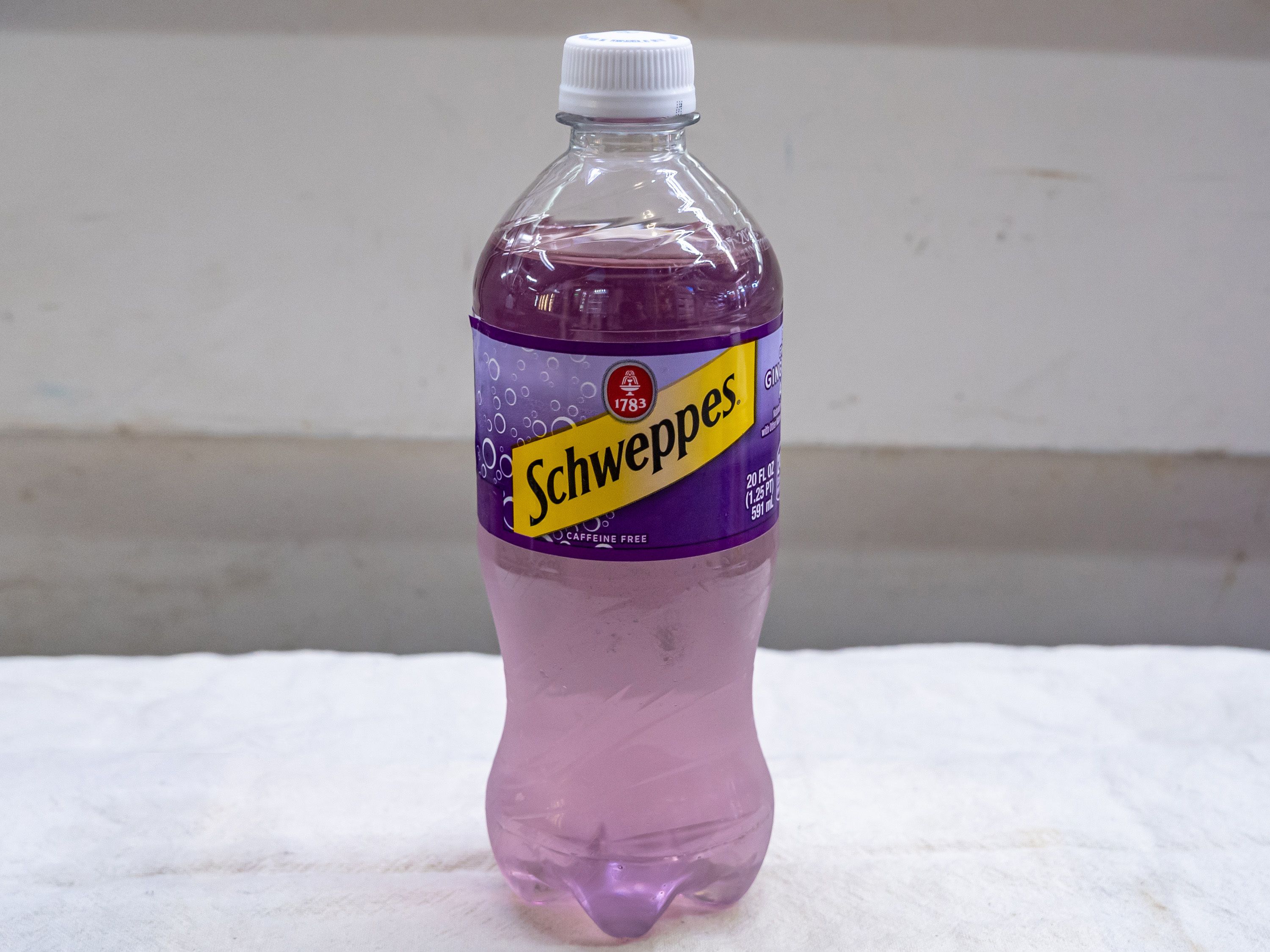 Order Schweppes Dry Grap Ginger Ale -20oz bottle food online from Quentin Deli and Grocery store, Brooklyn on bringmethat.com
