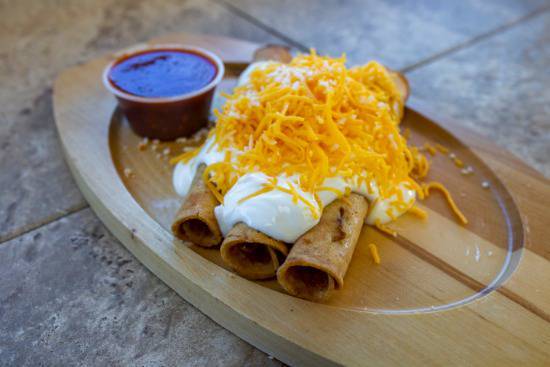 Order 3 Rolled Tacos Beef w/Chedder Cheese & Enchilado Cheese food online from Roberto's Taco shop store, Henderson on bringmethat.com