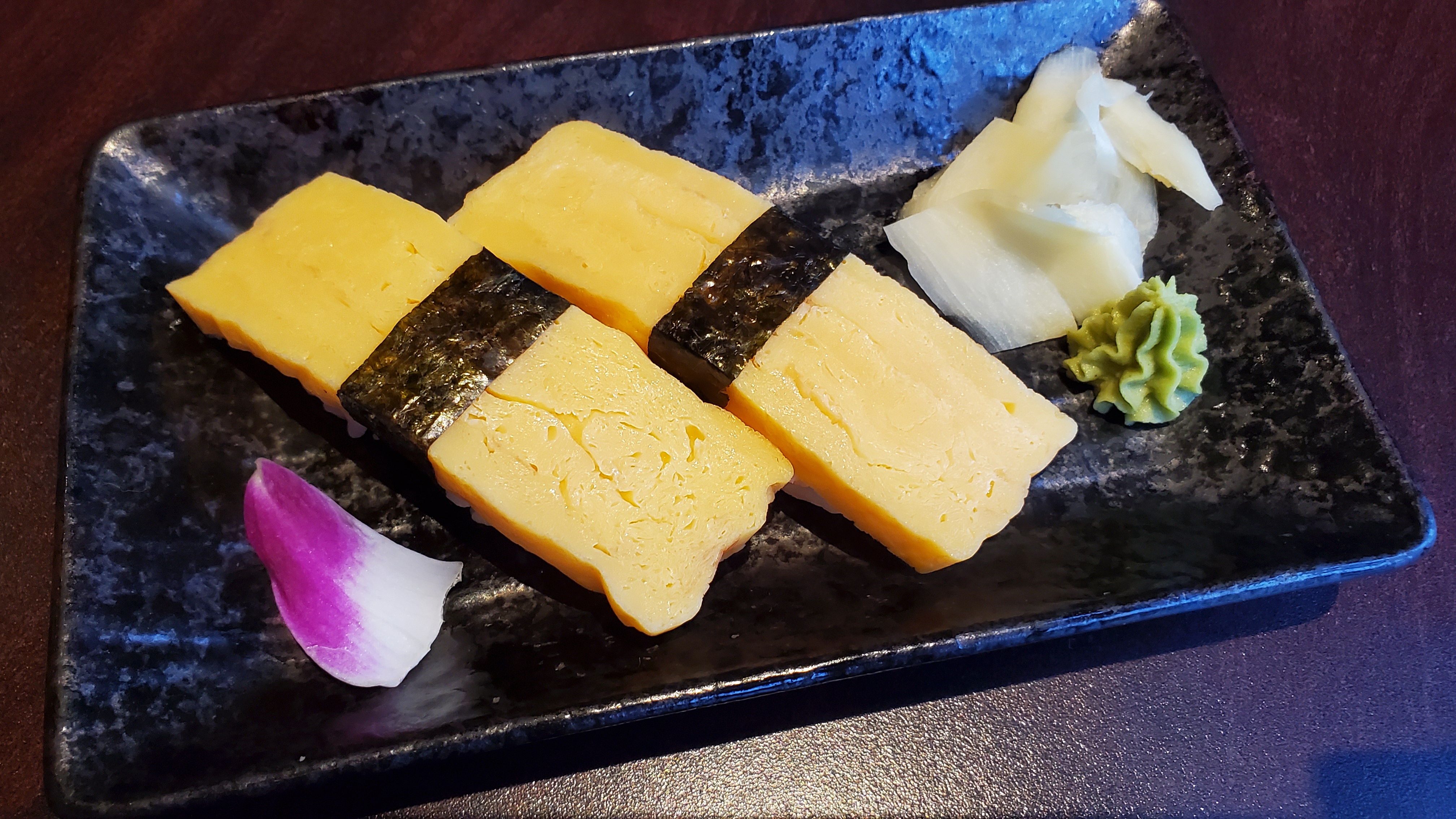 Order Tamago / Sweet Egg food online from Tsui Sushi Bar store, Seattle on bringmethat.com