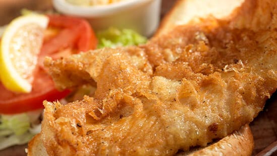 Order Big Fish Sandwich ＆ WC Salad food online from Hooters store, Riverside on bringmethat.com