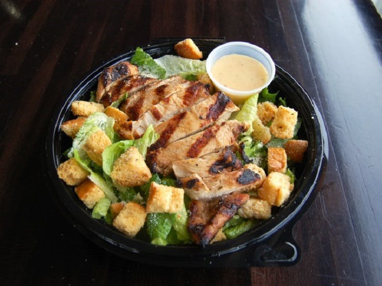 Order Chicken Caesar Salad - Large food online from Claymont Steak Shop store, Claymont on bringmethat.com