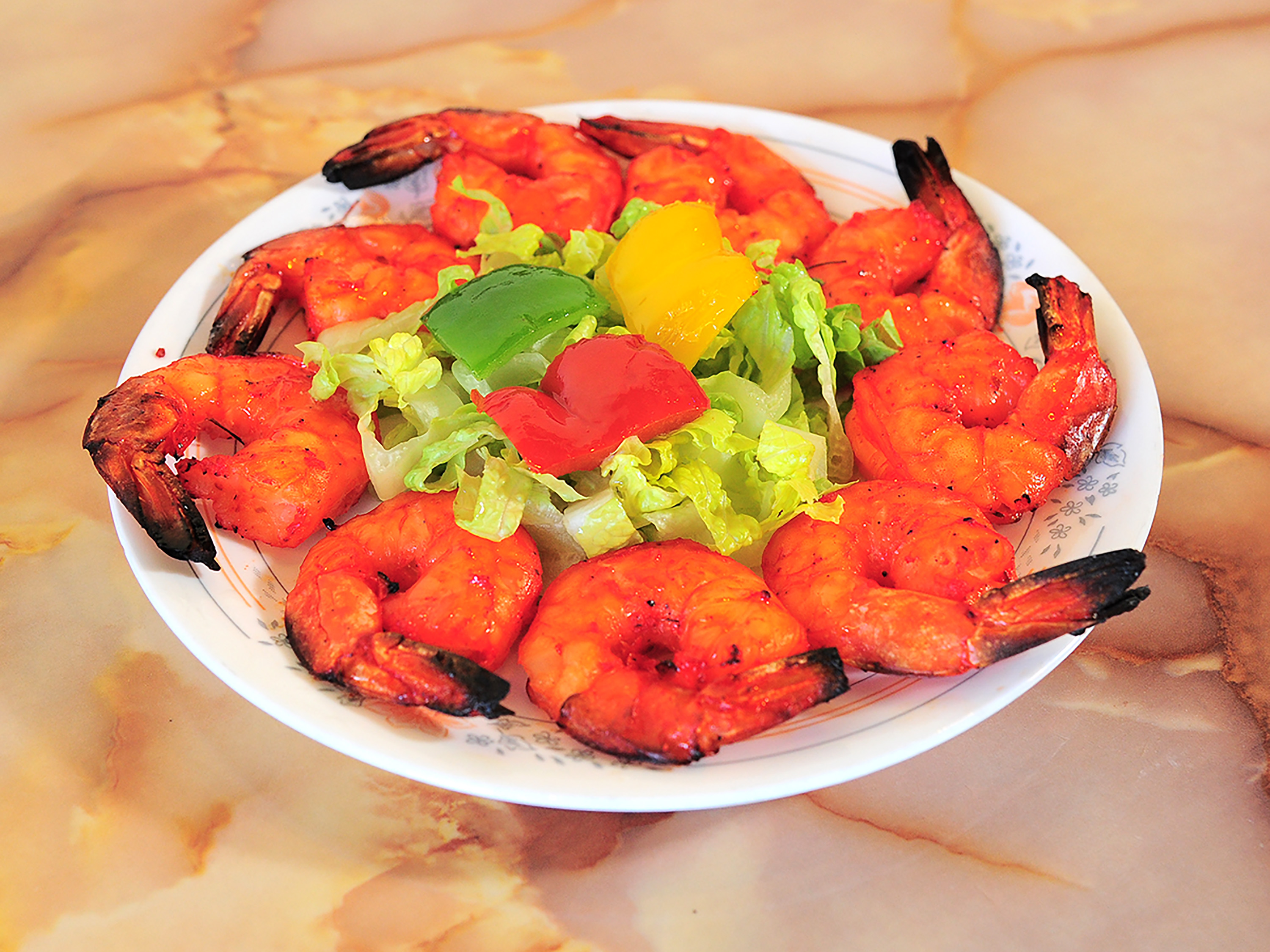 Order 61. Tandoori Shrimp food online from Haveli Indian Cuisine store, Rochester on bringmethat.com