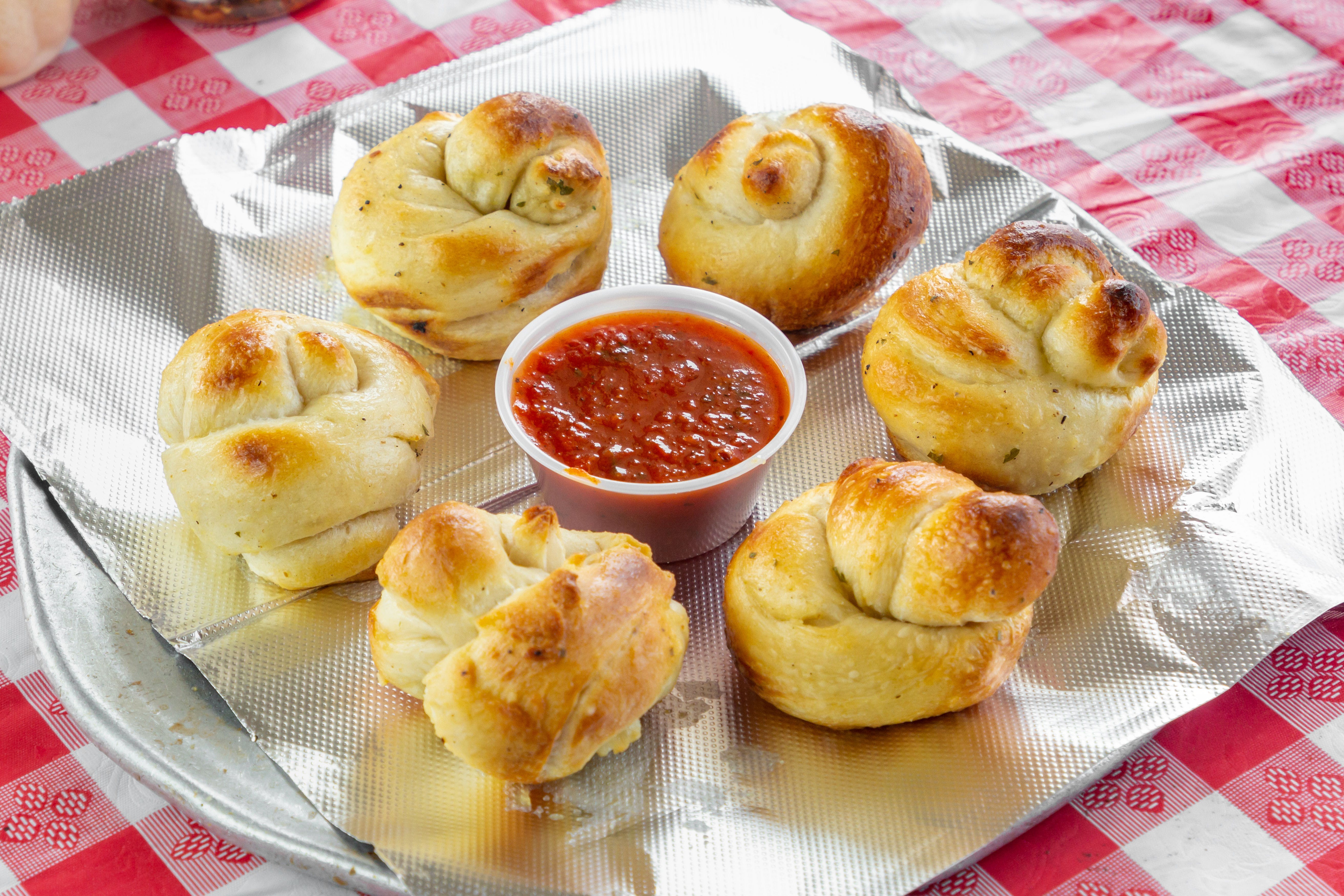 Order Garlic Knots - 5 Pieces food online from Pizza Central store, Colonie on bringmethat.com