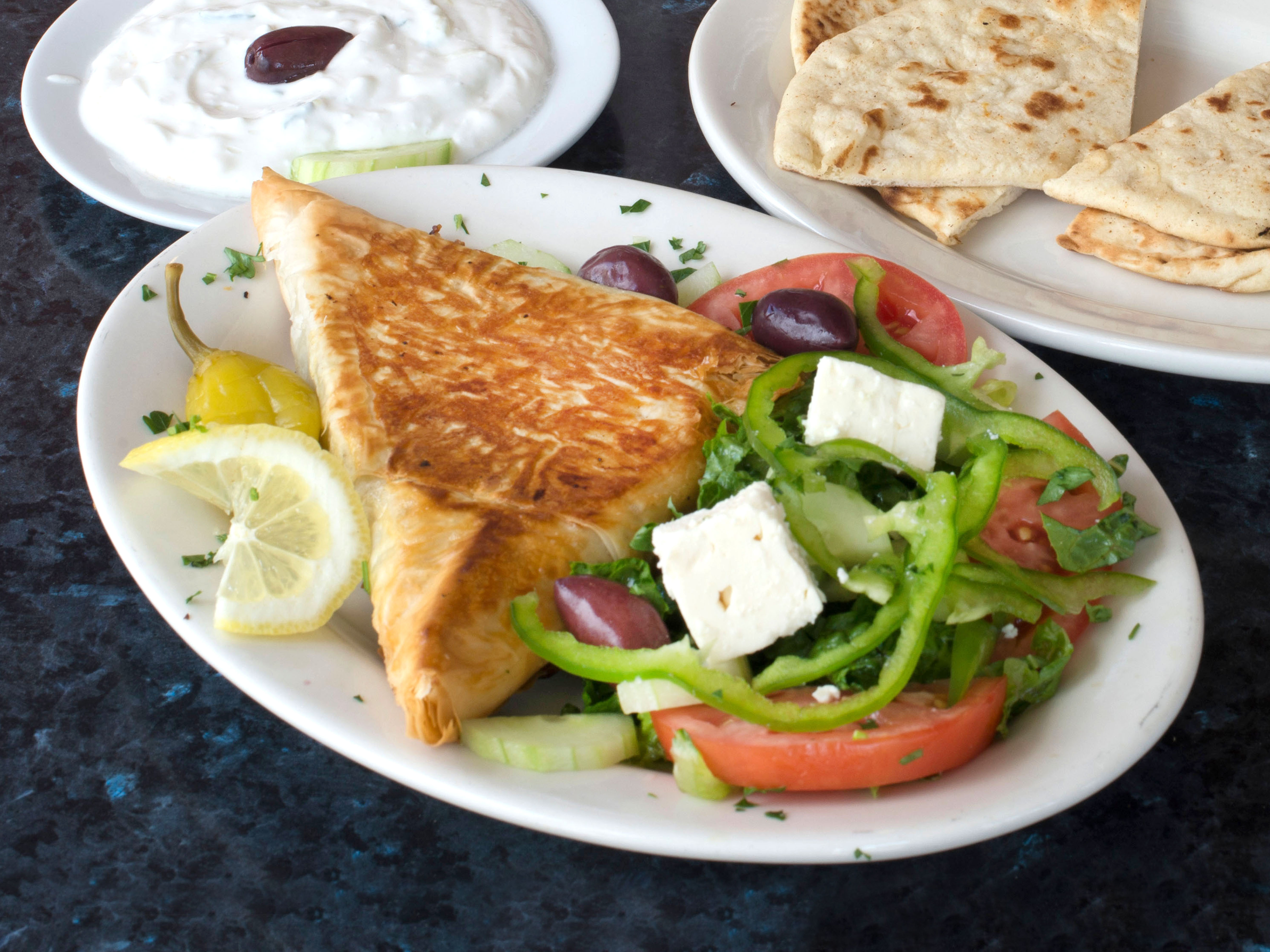 Order Spinach Pie and Greek Salad Combo food online from Gyro Corner store, Flushing on bringmethat.com