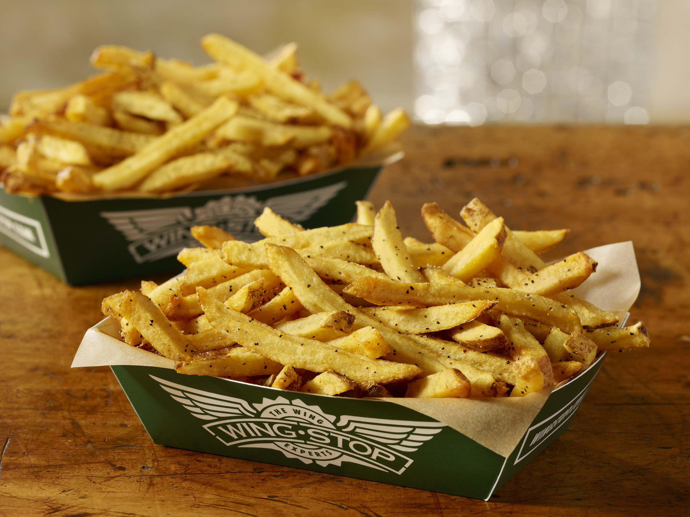 Order Seasoned Fries food online from Wingstop store, Champaign on bringmethat.com