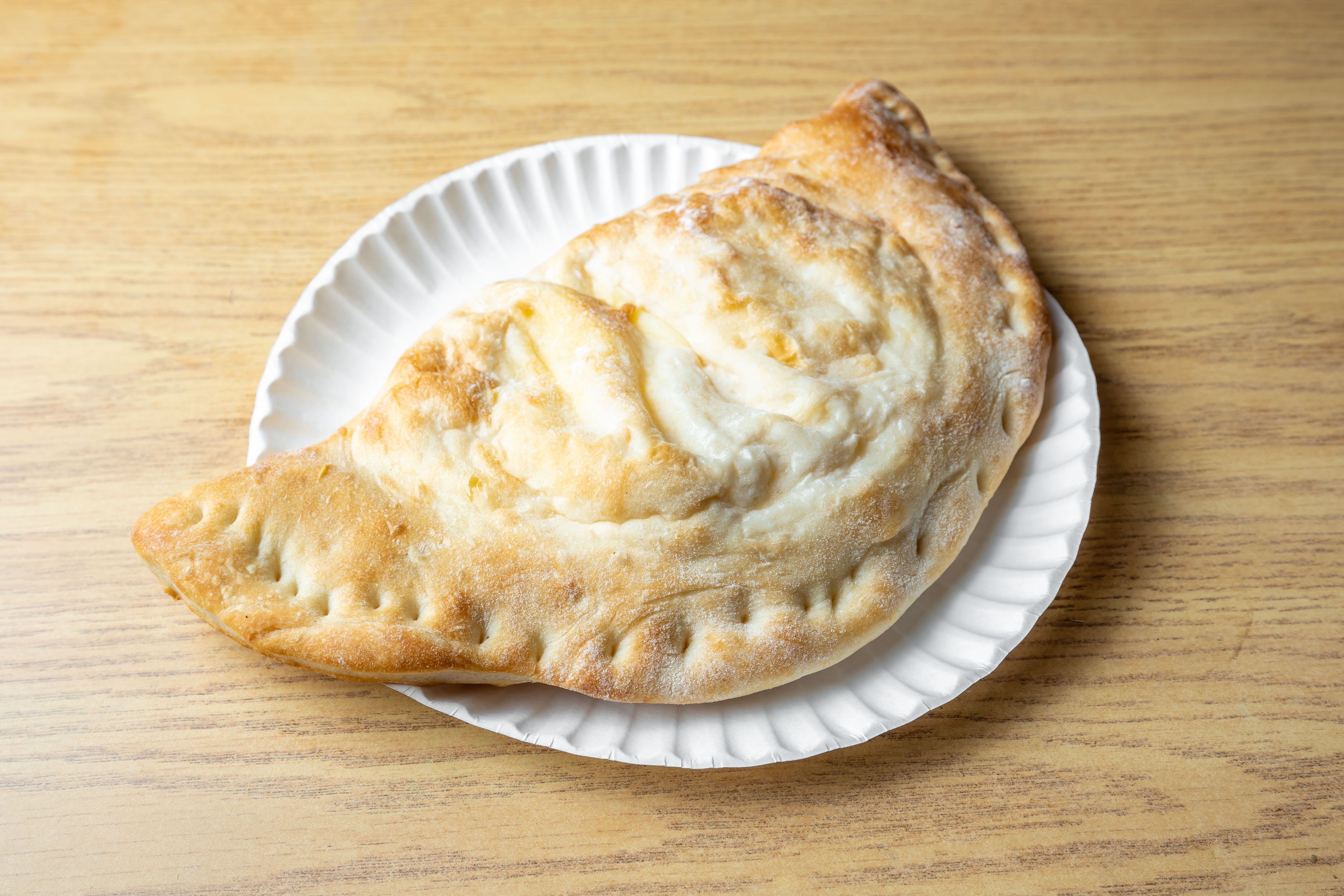 Order Cheese Calzone - Calzone food online from Big John's Pizza Brew store, Queens Village on bringmethat.com