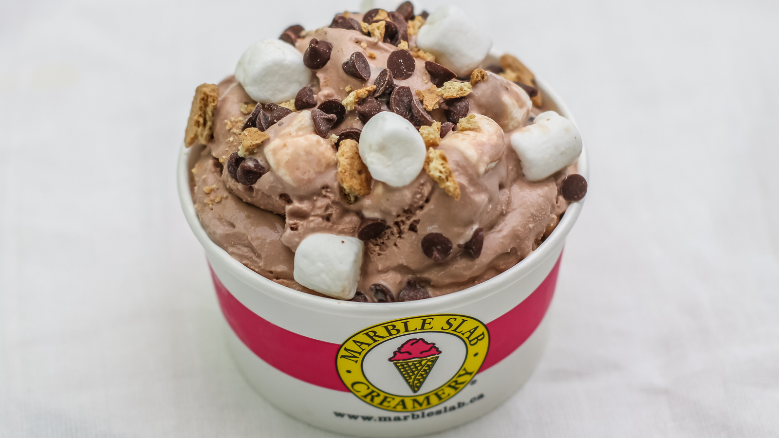 Order Large Cup with up to 3 mixins food online from The Marble Slab Creamery store, Pearland on bringmethat.com