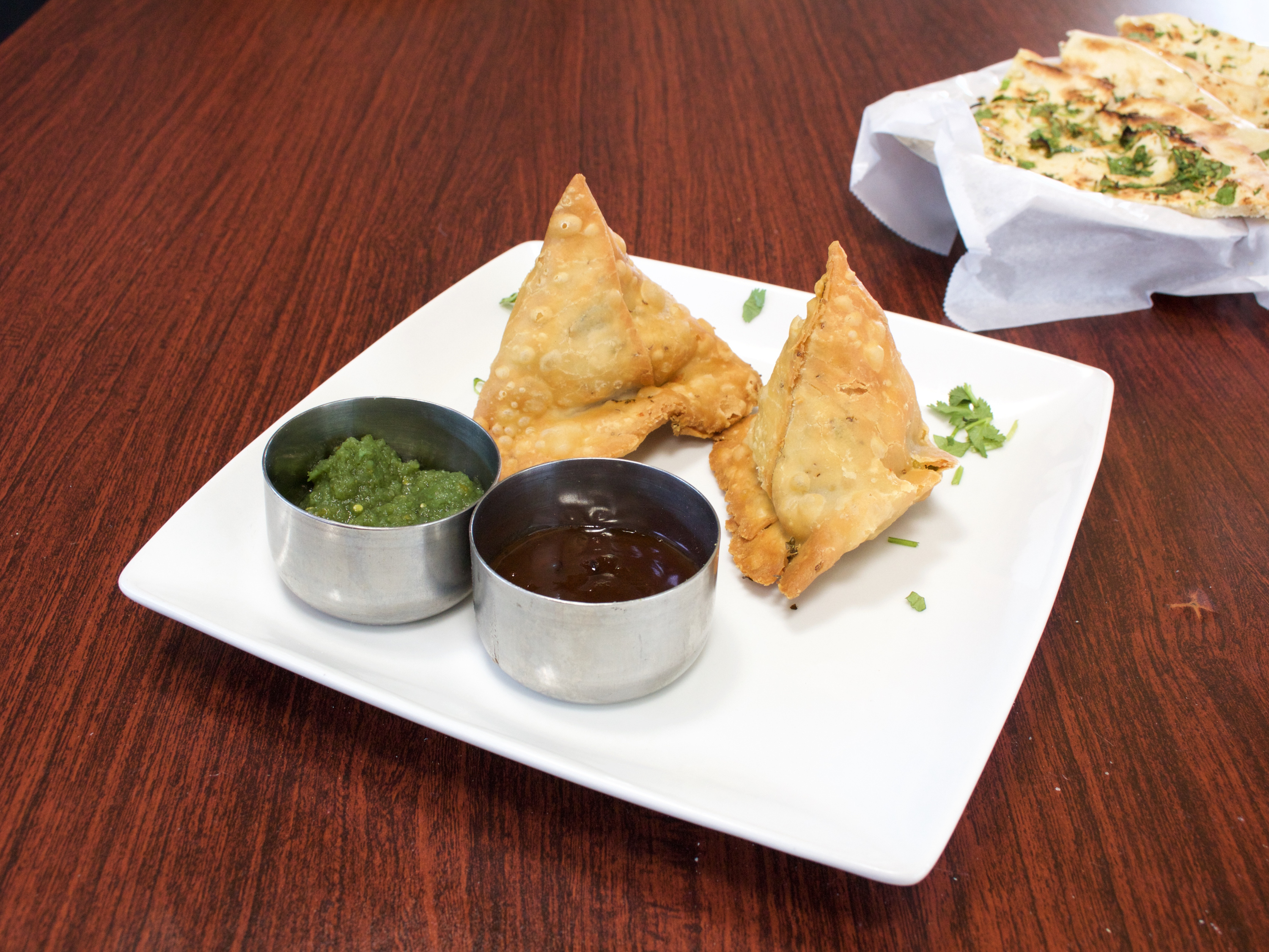 Order 2 Vegetable Samosa with Channa food online from Mother India Cuisine store, Ceres on bringmethat.com