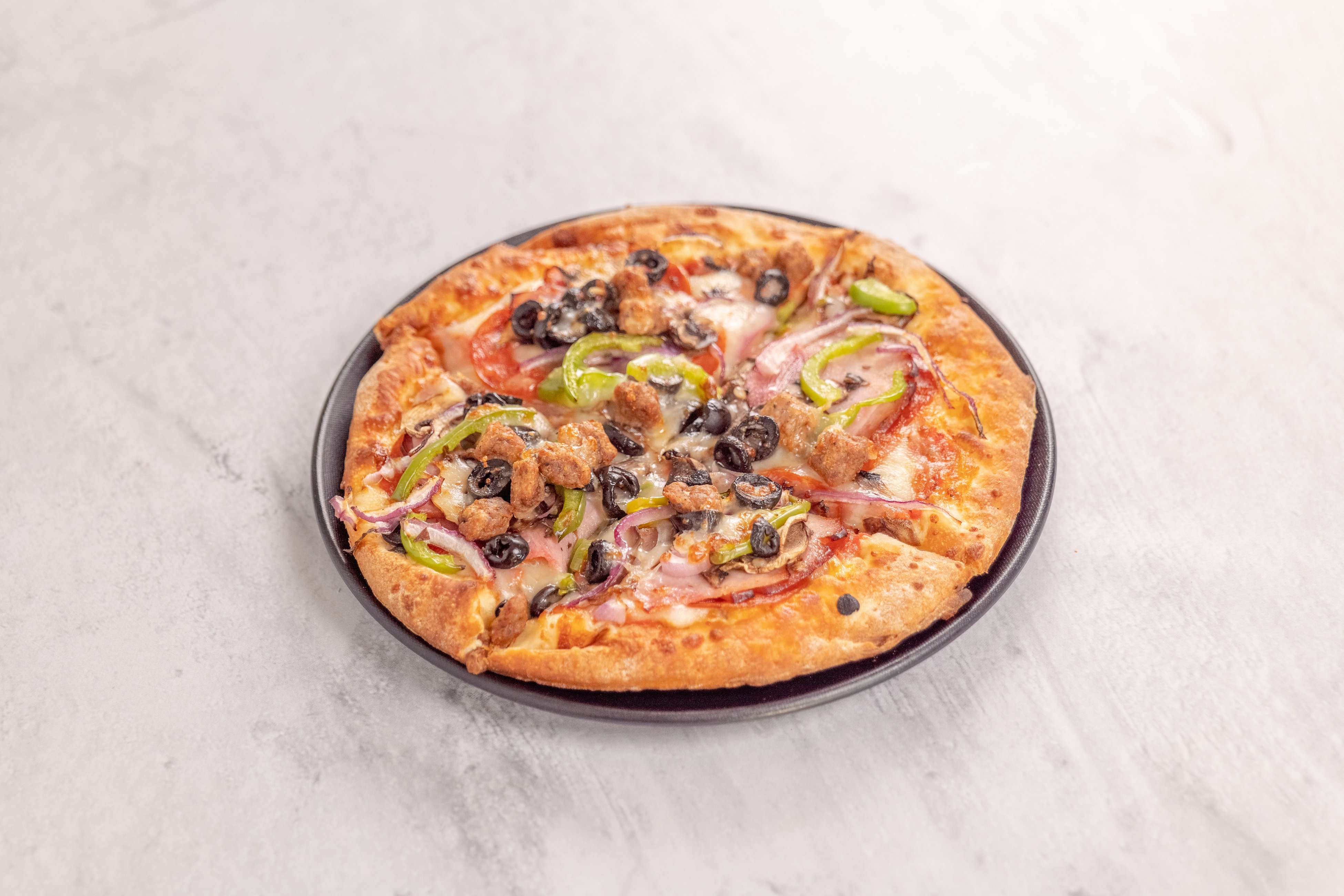 Order Deluxe Pizza food online from Valuetinas Pizza store, Anaheim on bringmethat.com