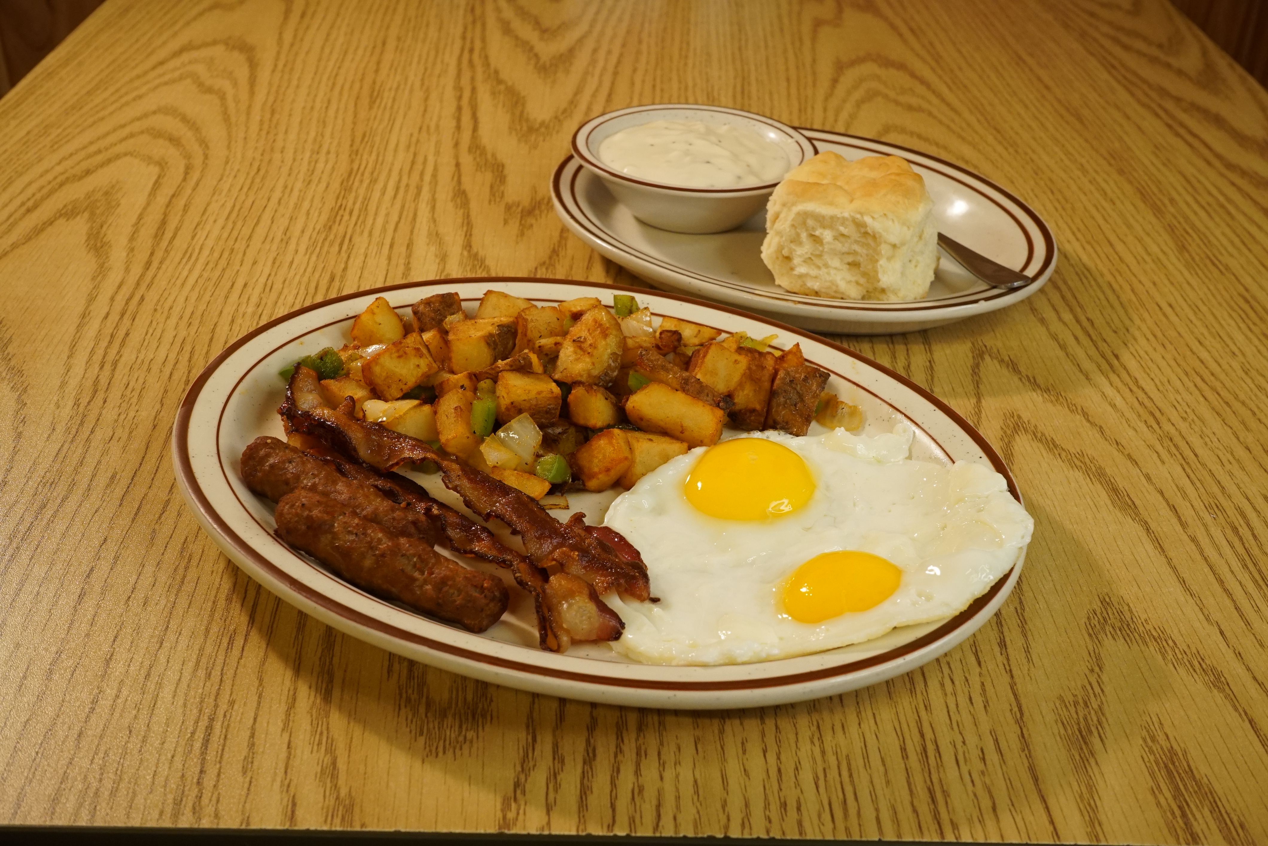 Order 2 Eggs with Bacon food online from Hasslers Restaurant store, Norman on bringmethat.com