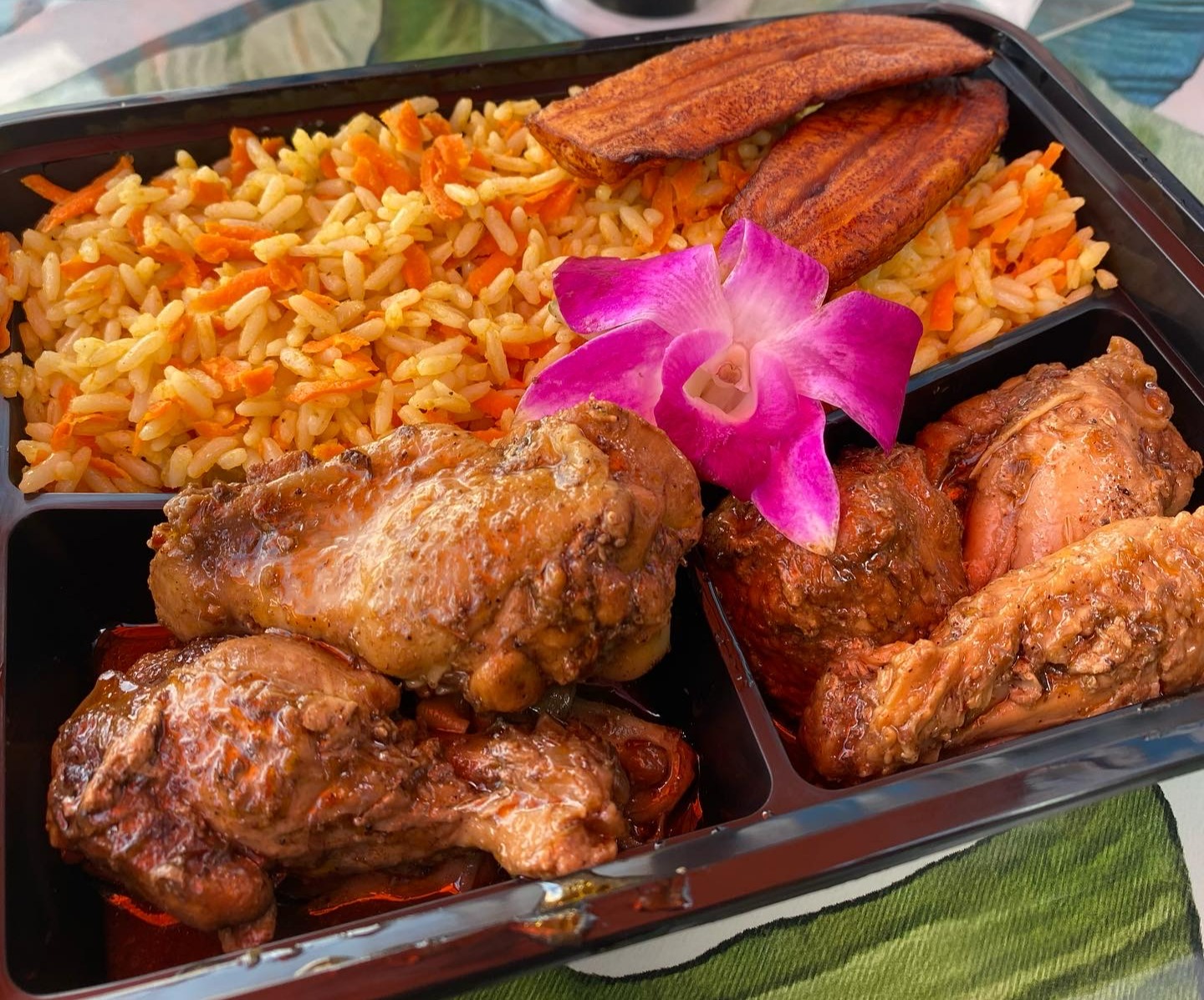 Order Jerk Chicken with Creole Rice food online from Cocobreeze store, Oakland on bringmethat.com