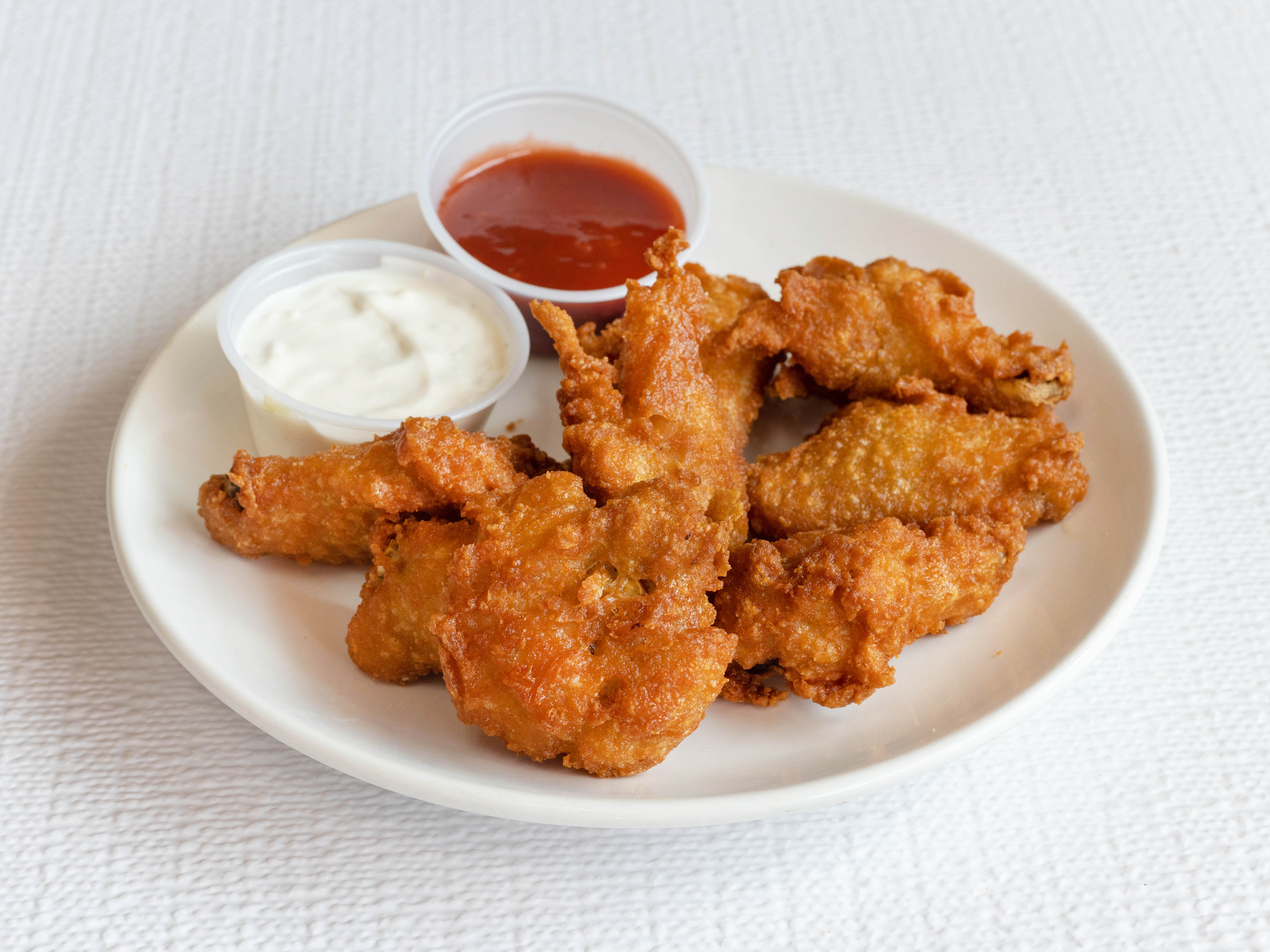 Order 7 Piece Buffalo Wings food online from Georgio's Pizzeria store, Jersey City on bringmethat.com