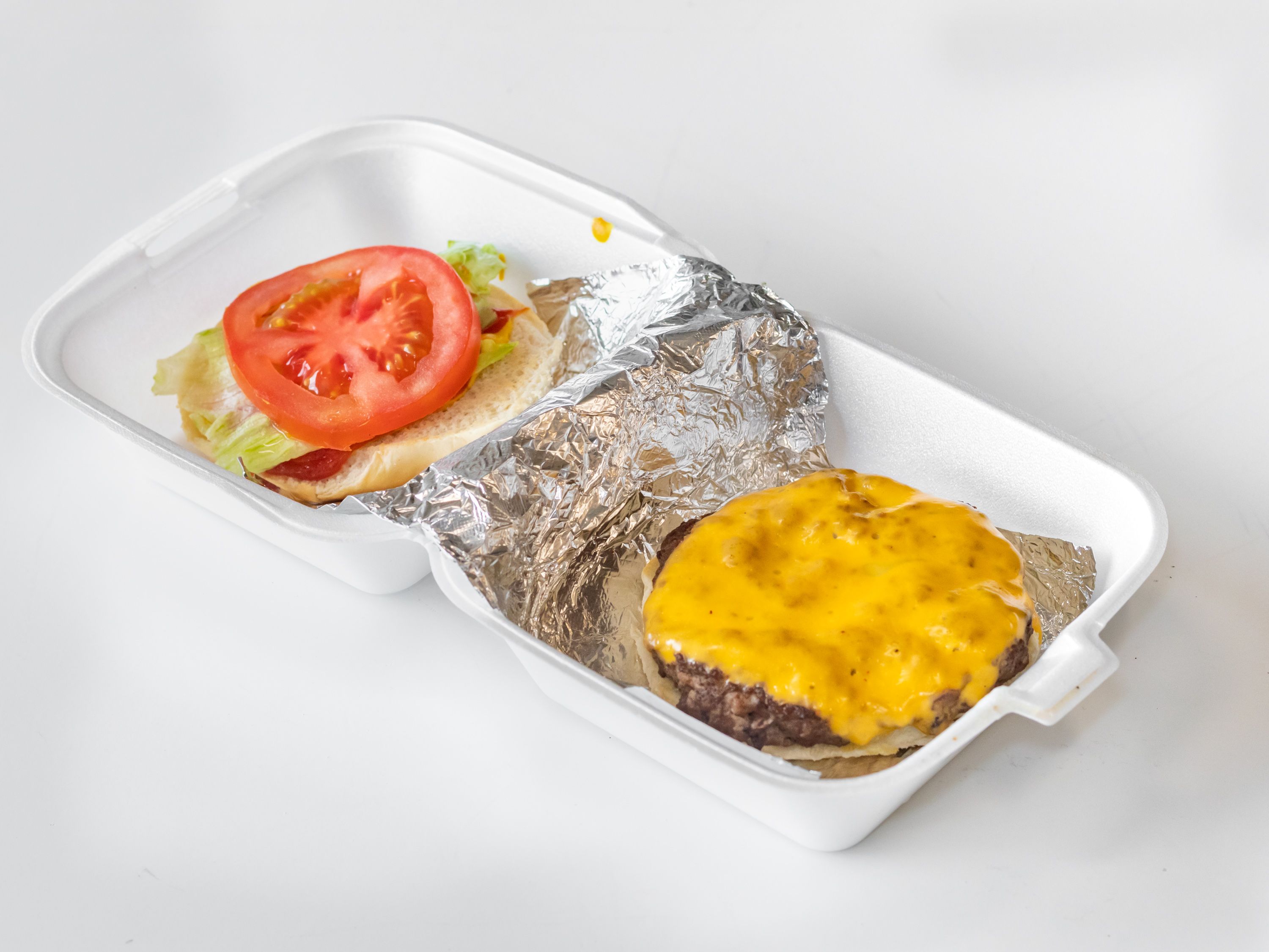 Order Cheeseburger food online from Mama Hotdogs store, Akron on bringmethat.com