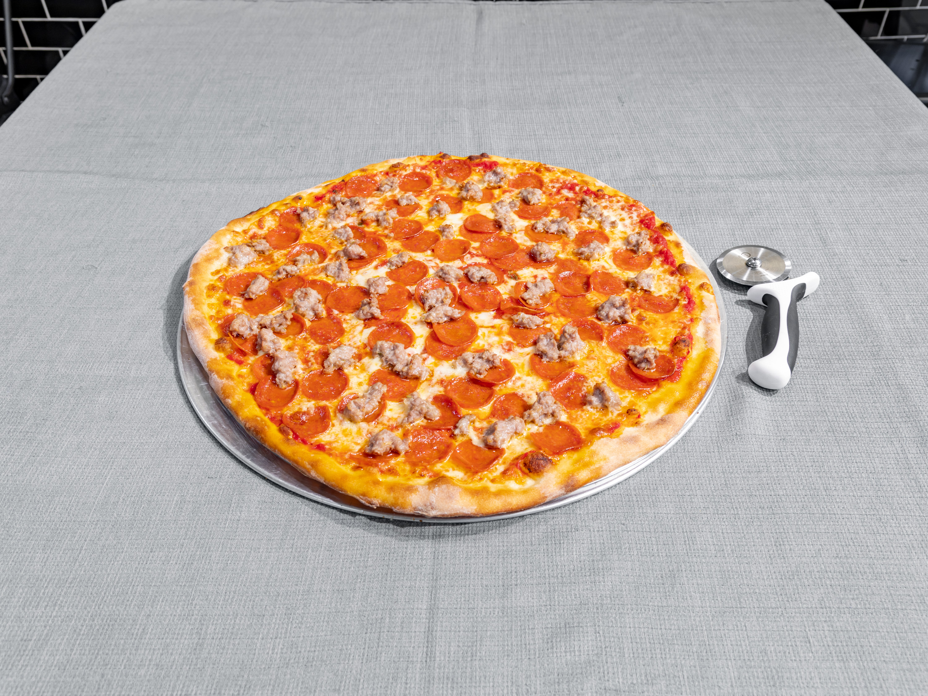 Order Sausage Pepperoni Pizza Pie food online from Carnegie Pizza store, New York on bringmethat.com