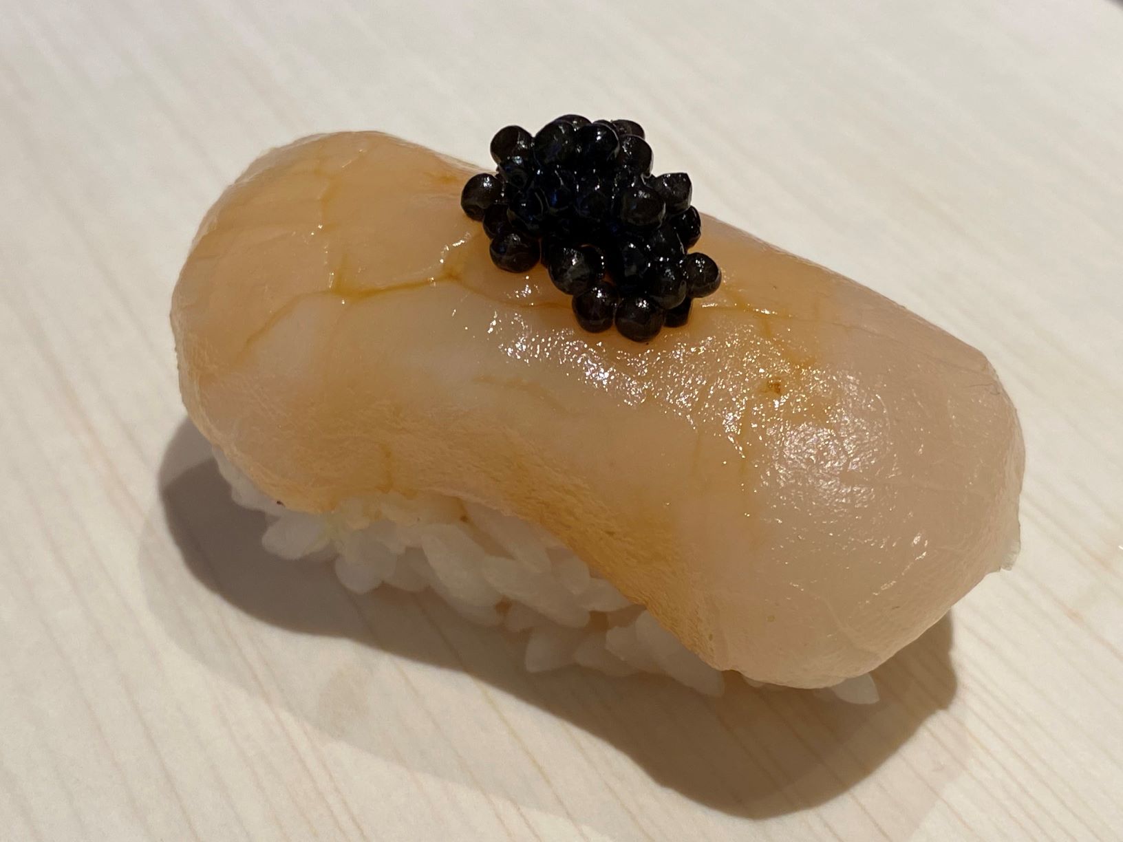 Order Fresh Scallop with Caviar food online from Ari Sushi store, New York on bringmethat.com