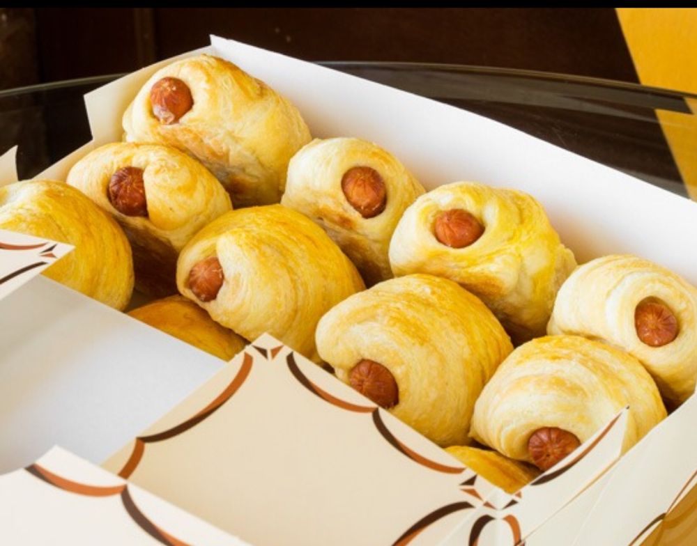 Order Croissant Sausage Roll food online from Momma's Donuts store, White Settlement on bringmethat.com
