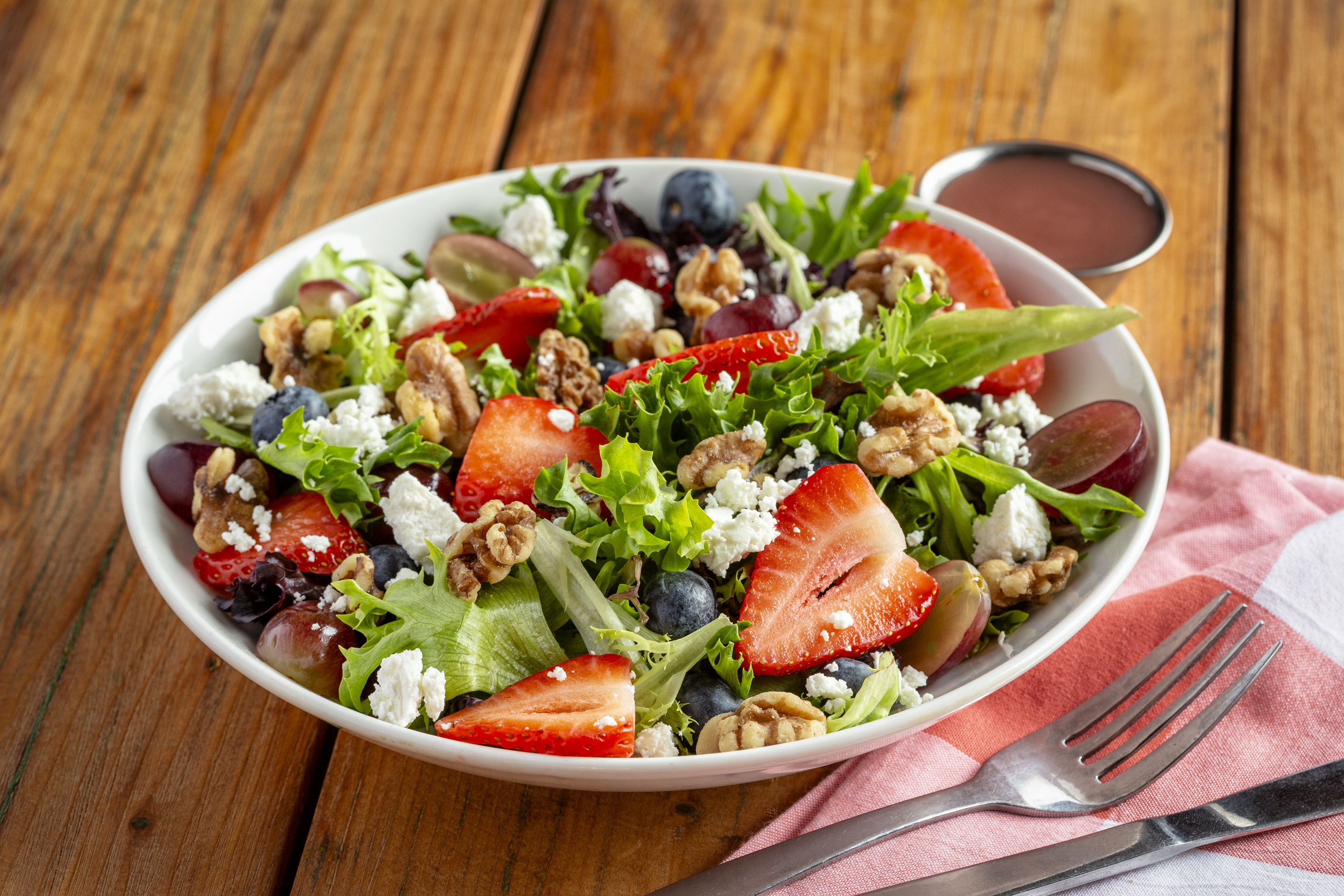 Order Berry and Goat Cheese Side Salad food online from Uno Chicago Grill store, Baltimore on bringmethat.com