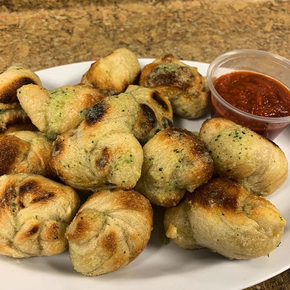 Order Garlic Knots - 12 Pieces food online from Finazzo's Italian Restaurant & Pizza store, Lancaster on bringmethat.com