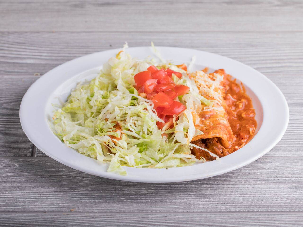 Order Beef Enchilada food online from Ray Mexican Restaurant store, San Diego on bringmethat.com