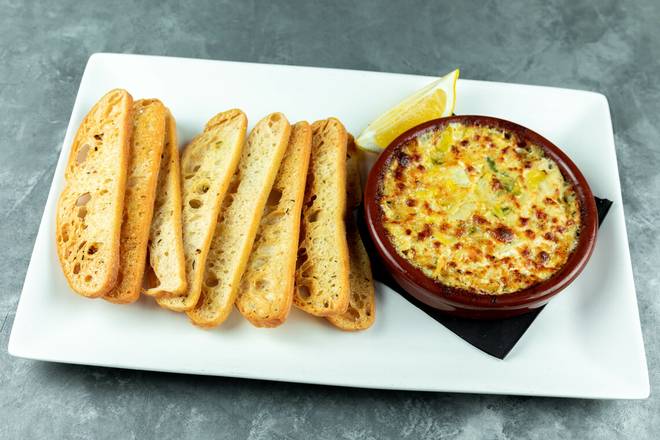 Order Famous Spicy Artichoke Dip food online from Patxi's Pizza store, Livermore on bringmethat.com