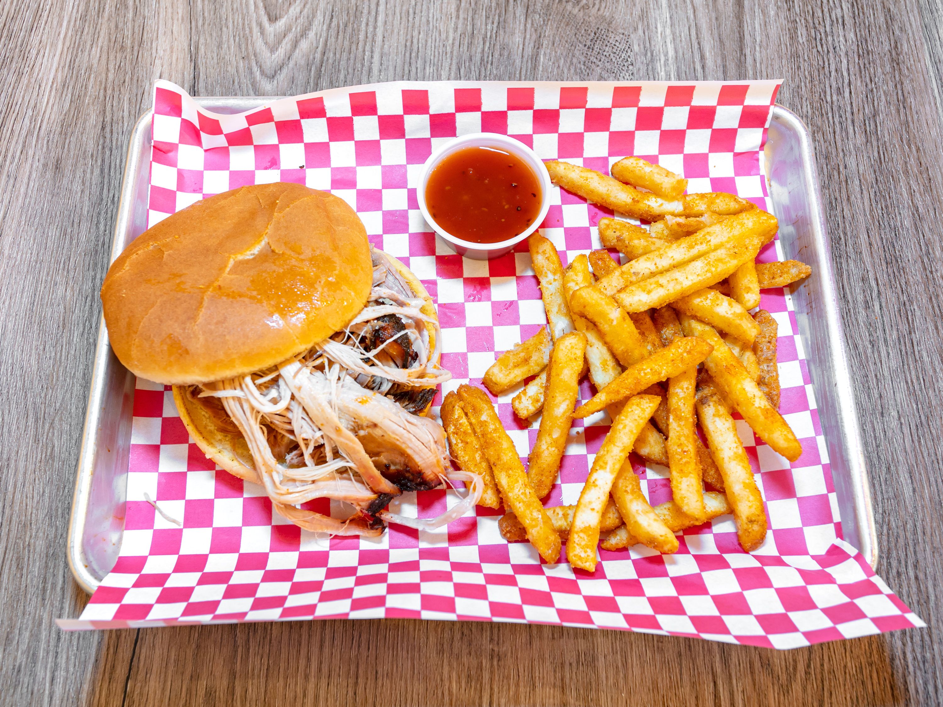 Order Smoked Pulled Pork Sandwich food online from Home Town Steak & Que store, Euharlee on bringmethat.com