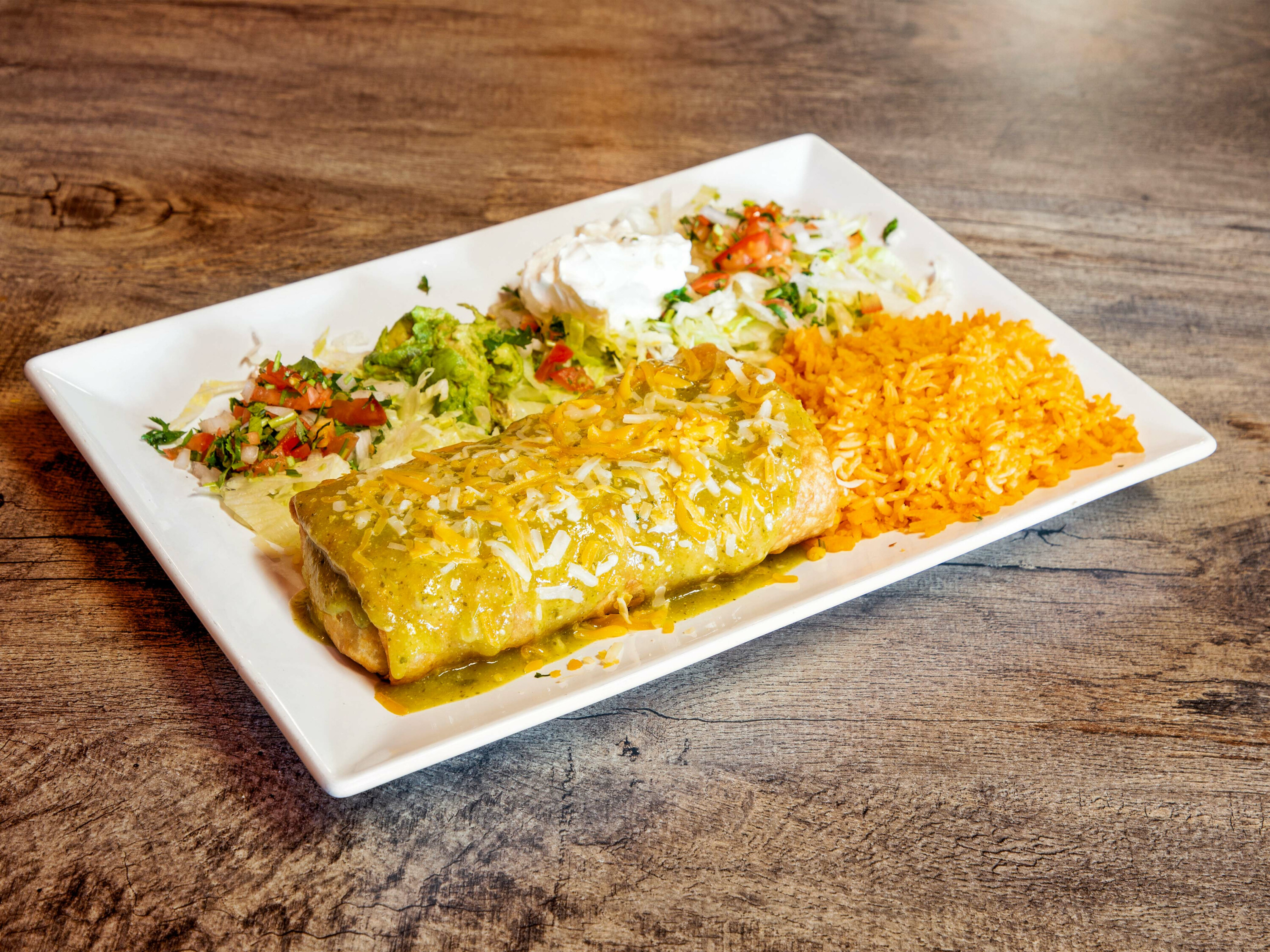 Order Green Chicken Chimichanga Burrito food online from Tacos Lupe store, Mesa on bringmethat.com