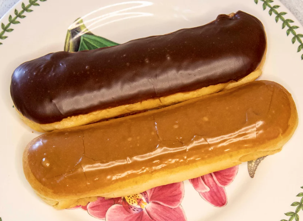 Order Chocolate Eclair food online from Donut Place store, Keller on bringmethat.com