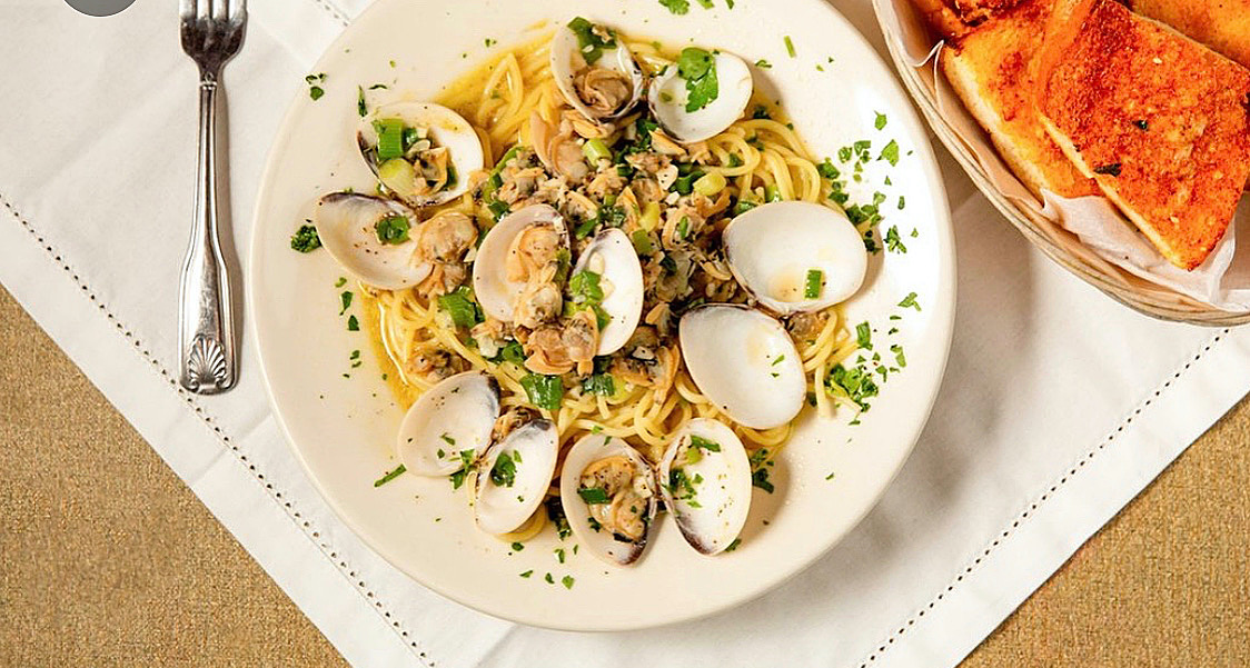 Order Spaghetti with Clam Sauce food online from Mona's Italian Restaurant store, San Diego on bringmethat.com