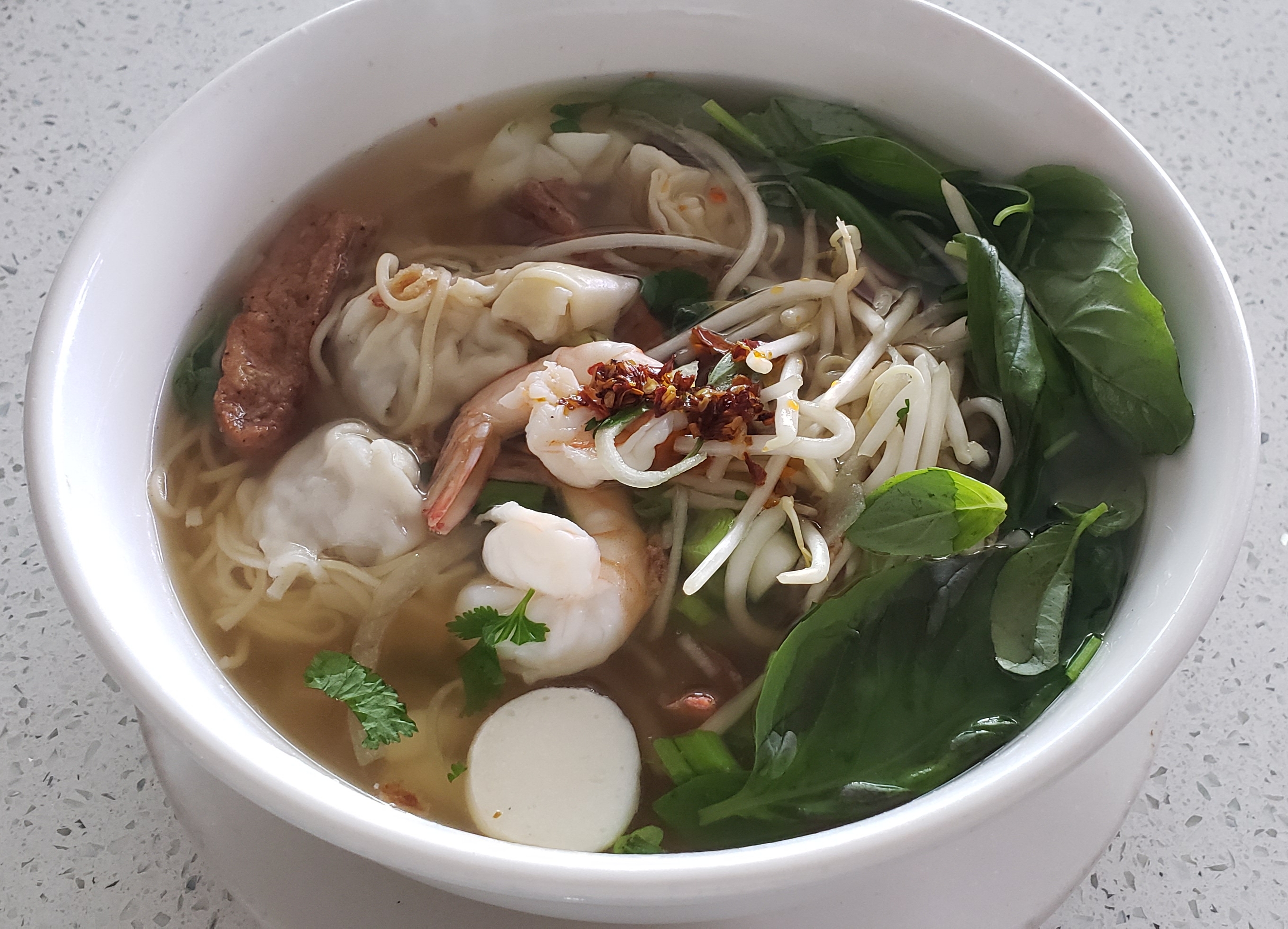 Order N2. Wonton and Seafood with Egg Noodle Soup food online from I Love Pho Menudo And Taco store, Fresno on bringmethat.com