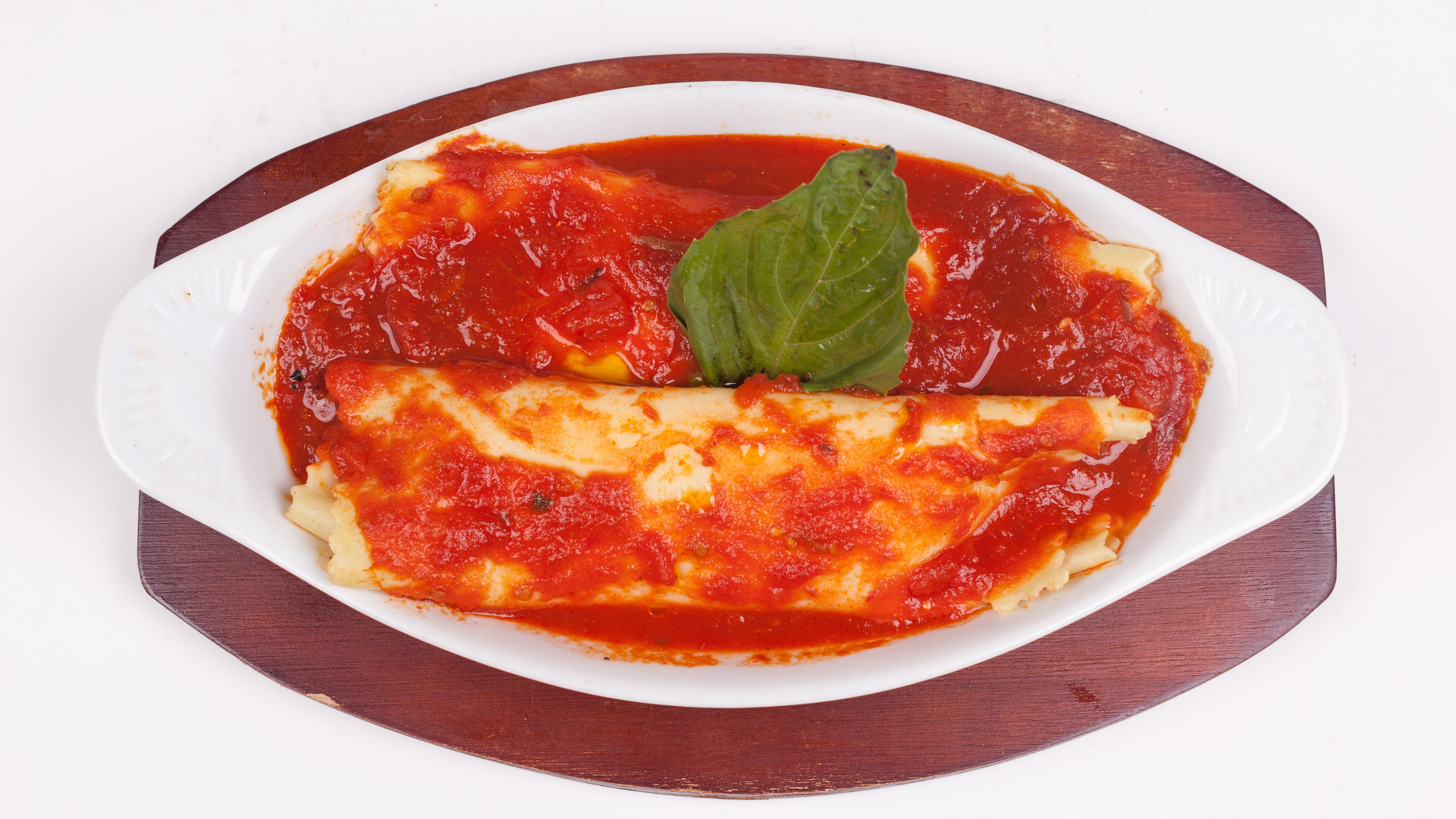 Order Manicotti food online from Umberto's Pizzeria store, New Hyde Park on bringmethat.com