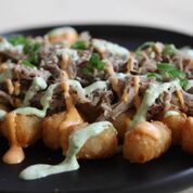 Order Loaded Tots food online from Makana store, New York on bringmethat.com