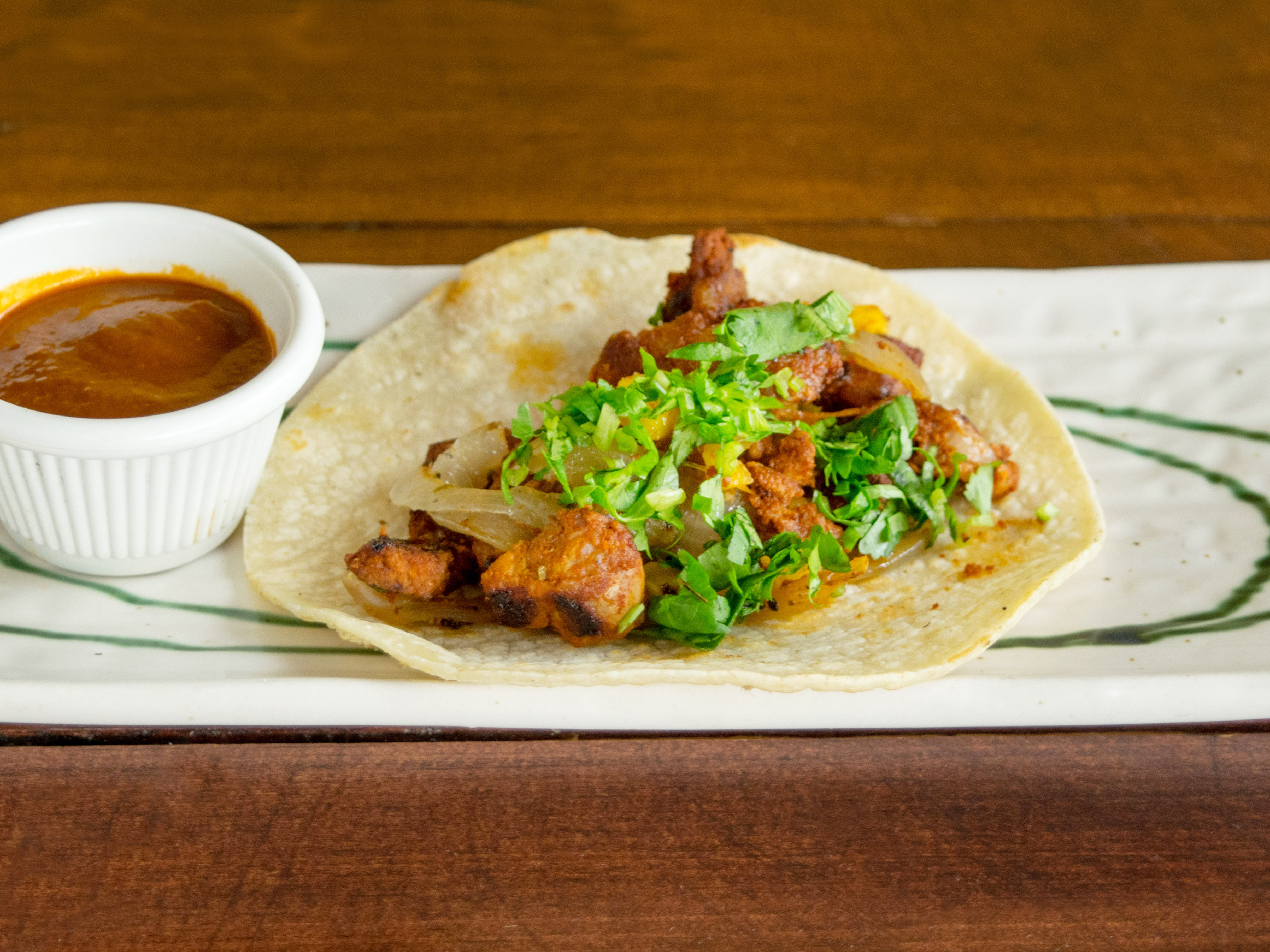 Order Al Pastor Taco food online from Corazon de Cuba Taqueria store, Long Beach on bringmethat.com