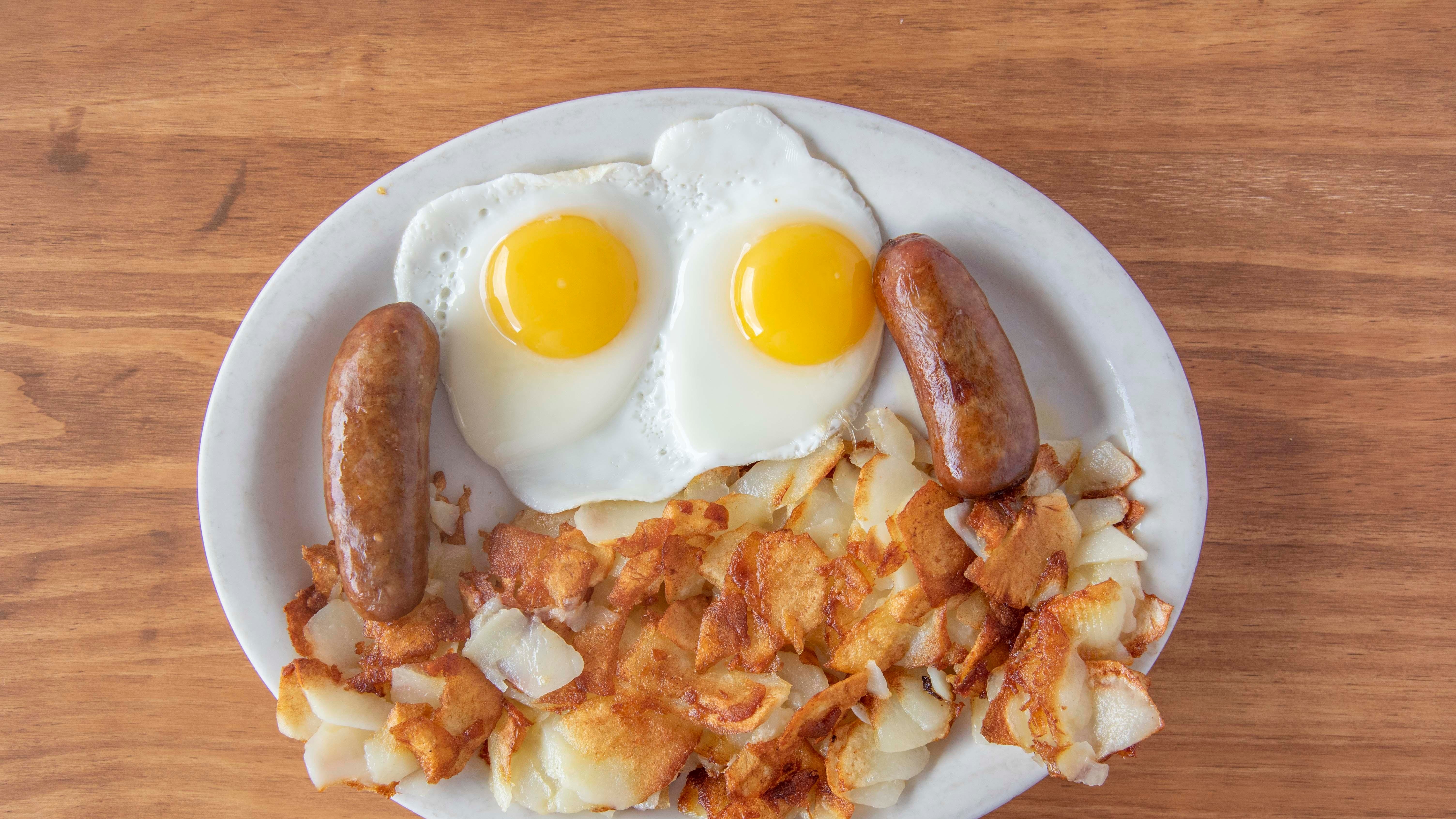 Order 2 Eggs Any Style with Meat food online from John's Diner store, New Cumberland on bringmethat.com
