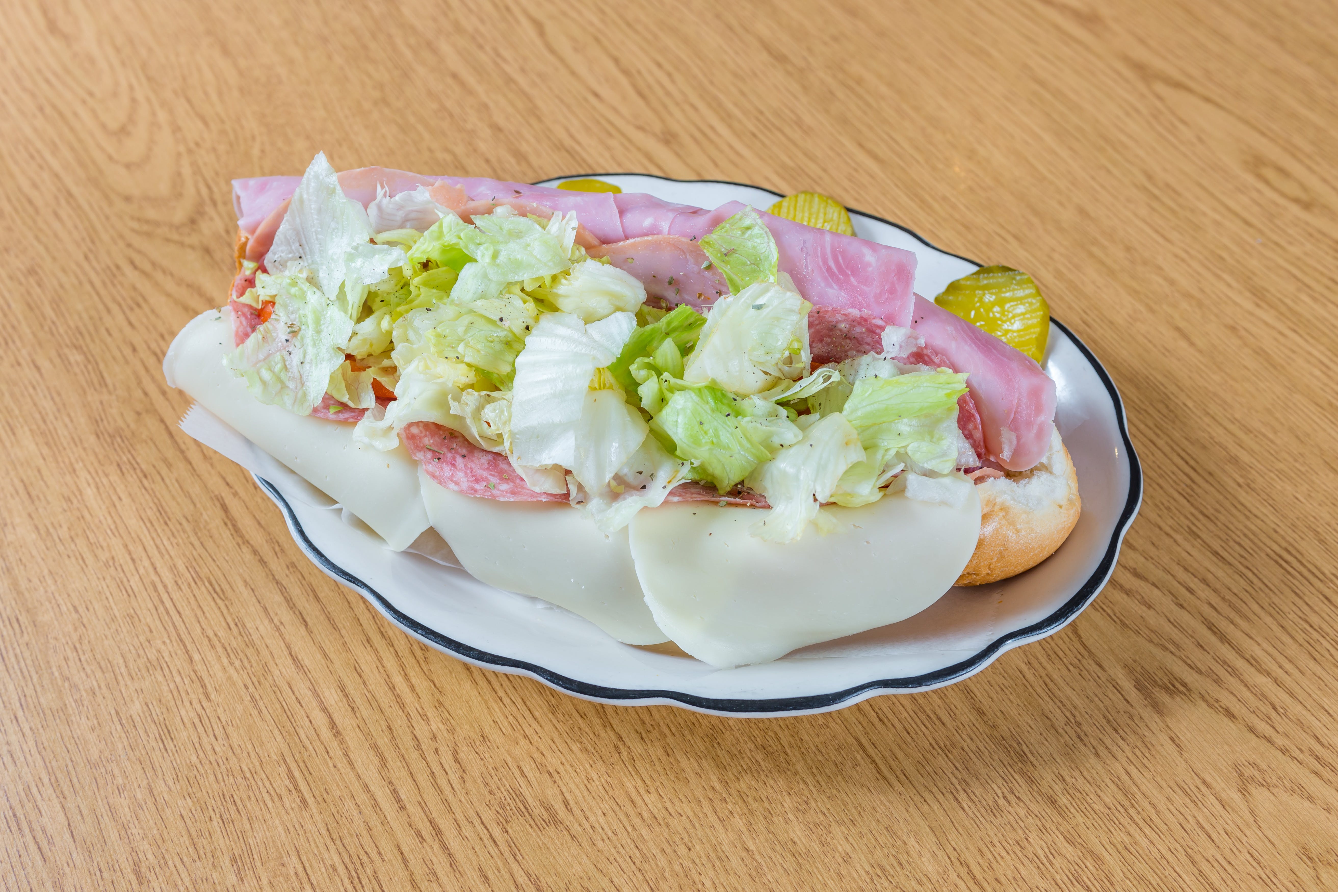 Order Italian Sub - Sub food online from Andre's Pizza store, Oxford on bringmethat.com
