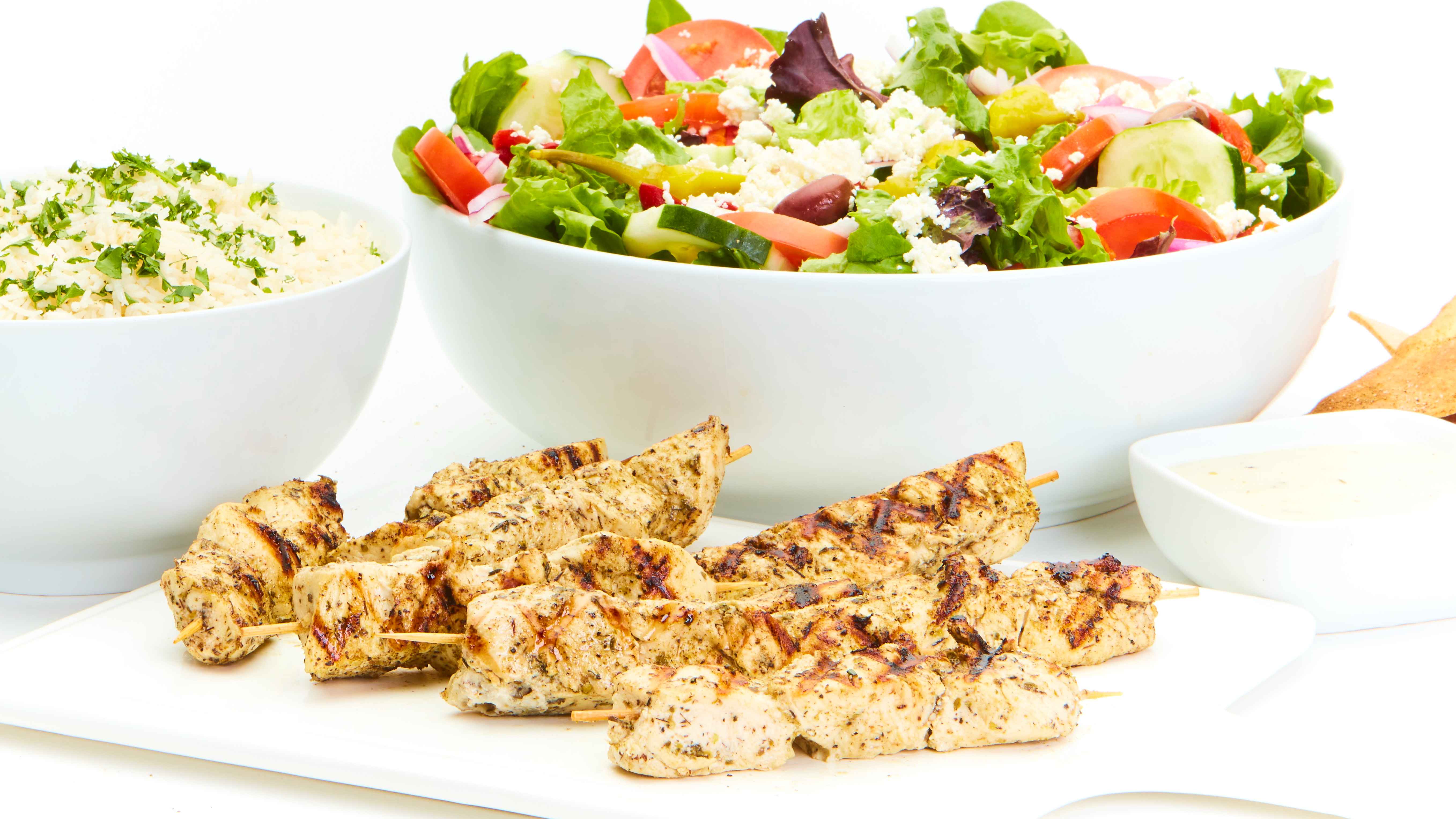Order Grilled Chicken Kebob Feast for 4 food online from Taziki's Mediterranean Cafe store, Charlotte on bringmethat.com