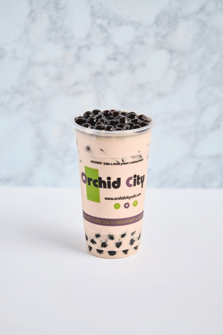 Order Jasmine Gr Milk Tea food online from Orchid City Fusion Cafe store, Arlington on bringmethat.com