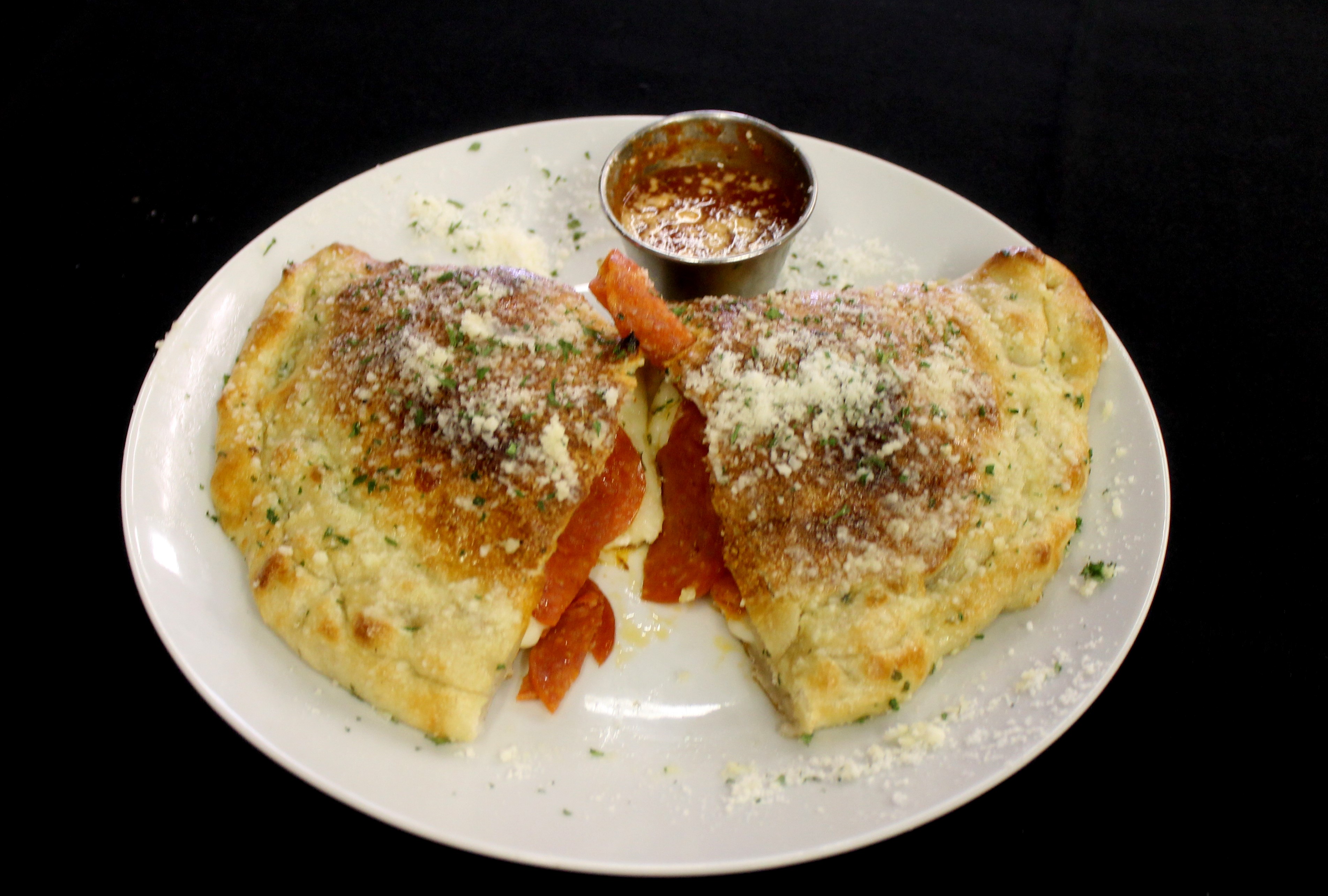 Order Cheese Calzone food online from Dolce Vita World Bistro store, Syracuse on bringmethat.com