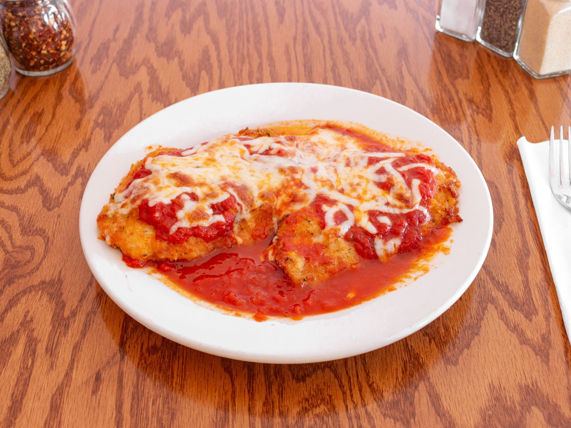Order Chicken Parmigiana Dinner food online from Three Boys From Italy store, Northvale on bringmethat.com
