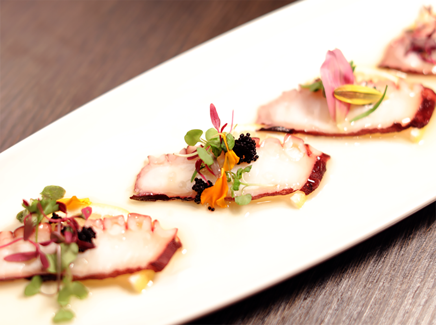 Order Octopus  carpaccio food online from Ise Sushi Japanese Restaurant store, Placentia on bringmethat.com
