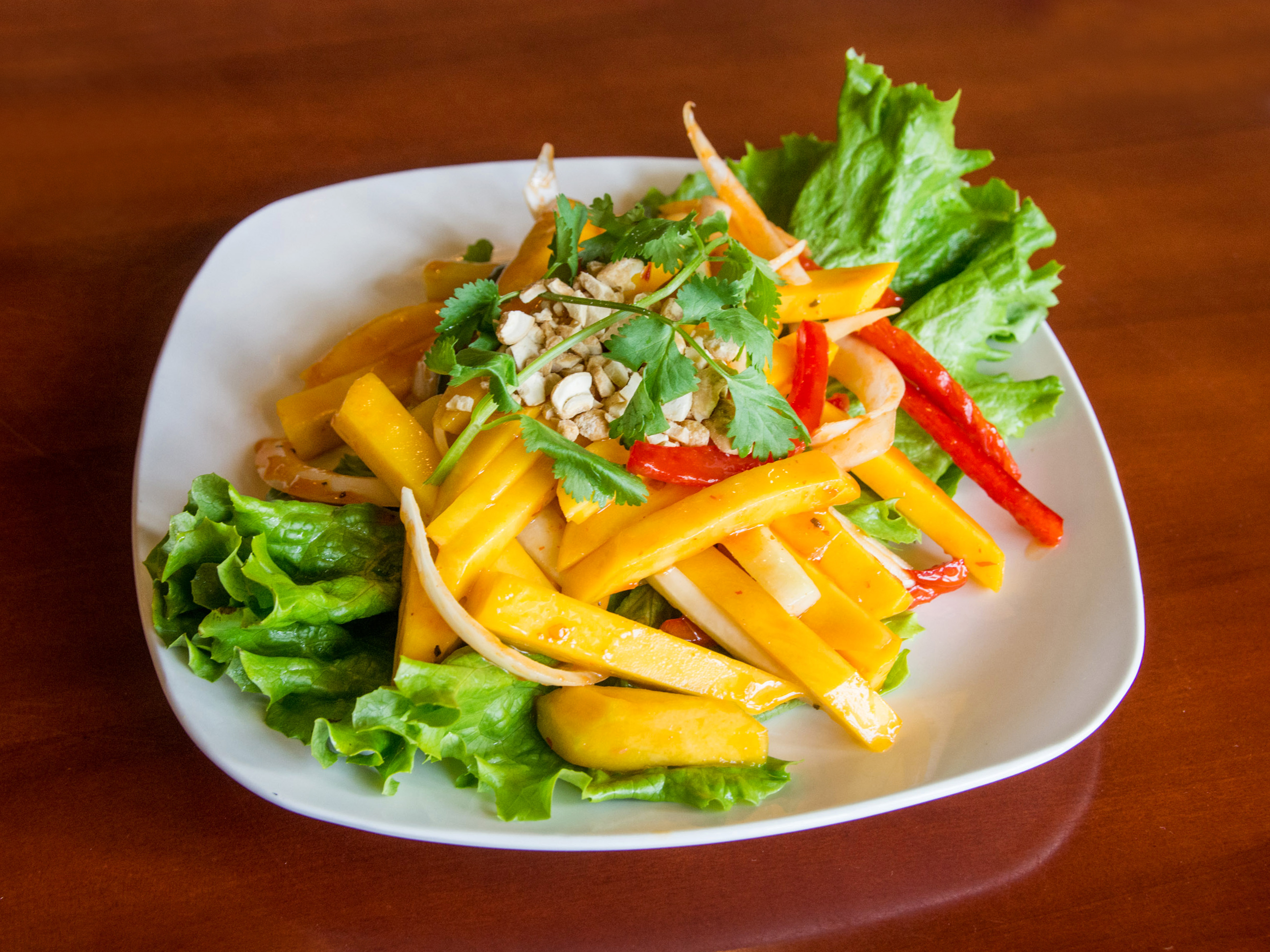 Order Mango Salad food online from Pinang store, Newark on bringmethat.com