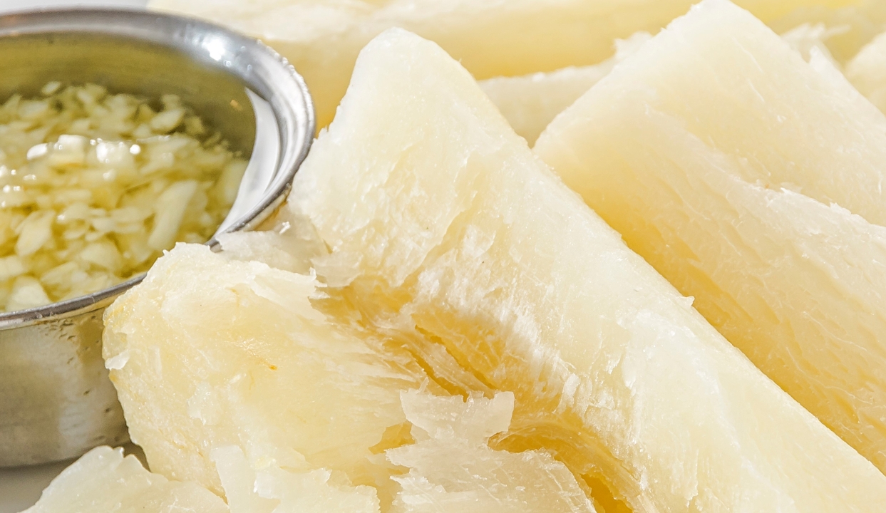 Order Yuca con Mojo food online from Papi Cuban store, Lawrenceville on bringmethat.com