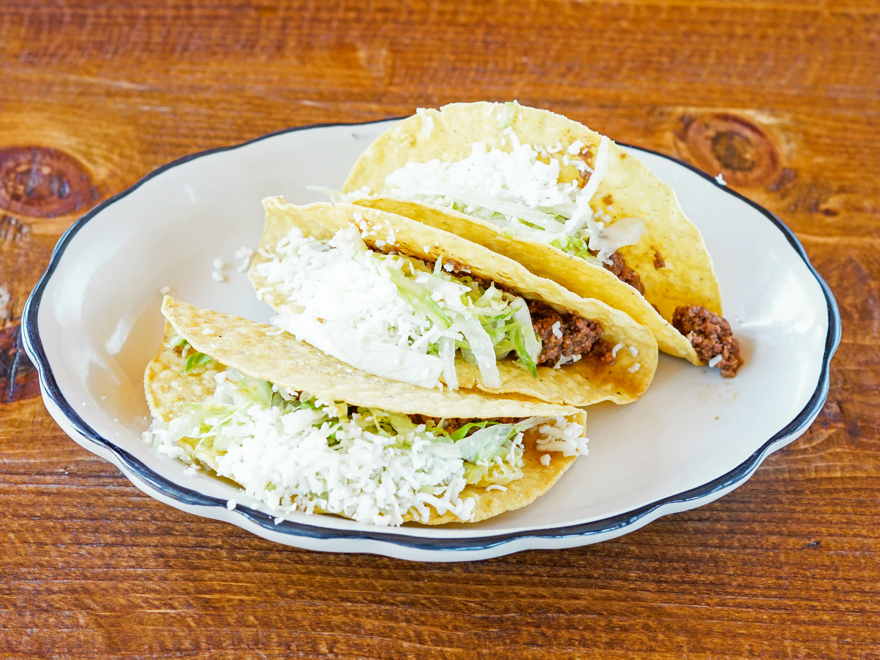 Order Order of Hard Tacos food online from Rey Azteca store, State College on bringmethat.com