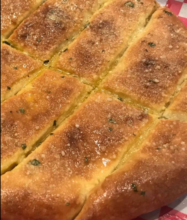 Order Garlic Breadsticks food online from La Famiglia Wood Fired Pizzeria store, Humble on bringmethat.com