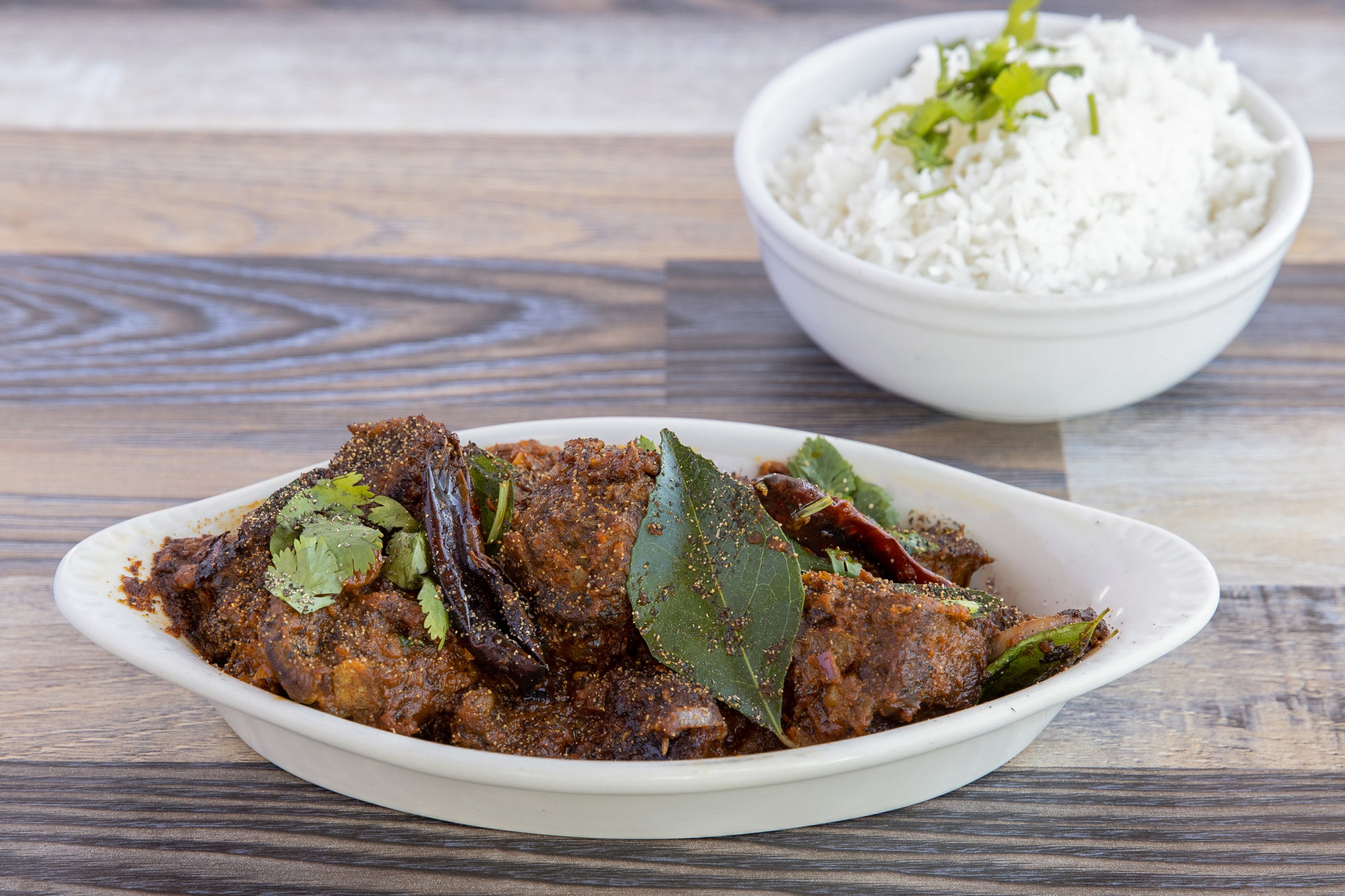 Order Goat Pepper Fry food online from Madras Cafe store, San Diego on bringmethat.com