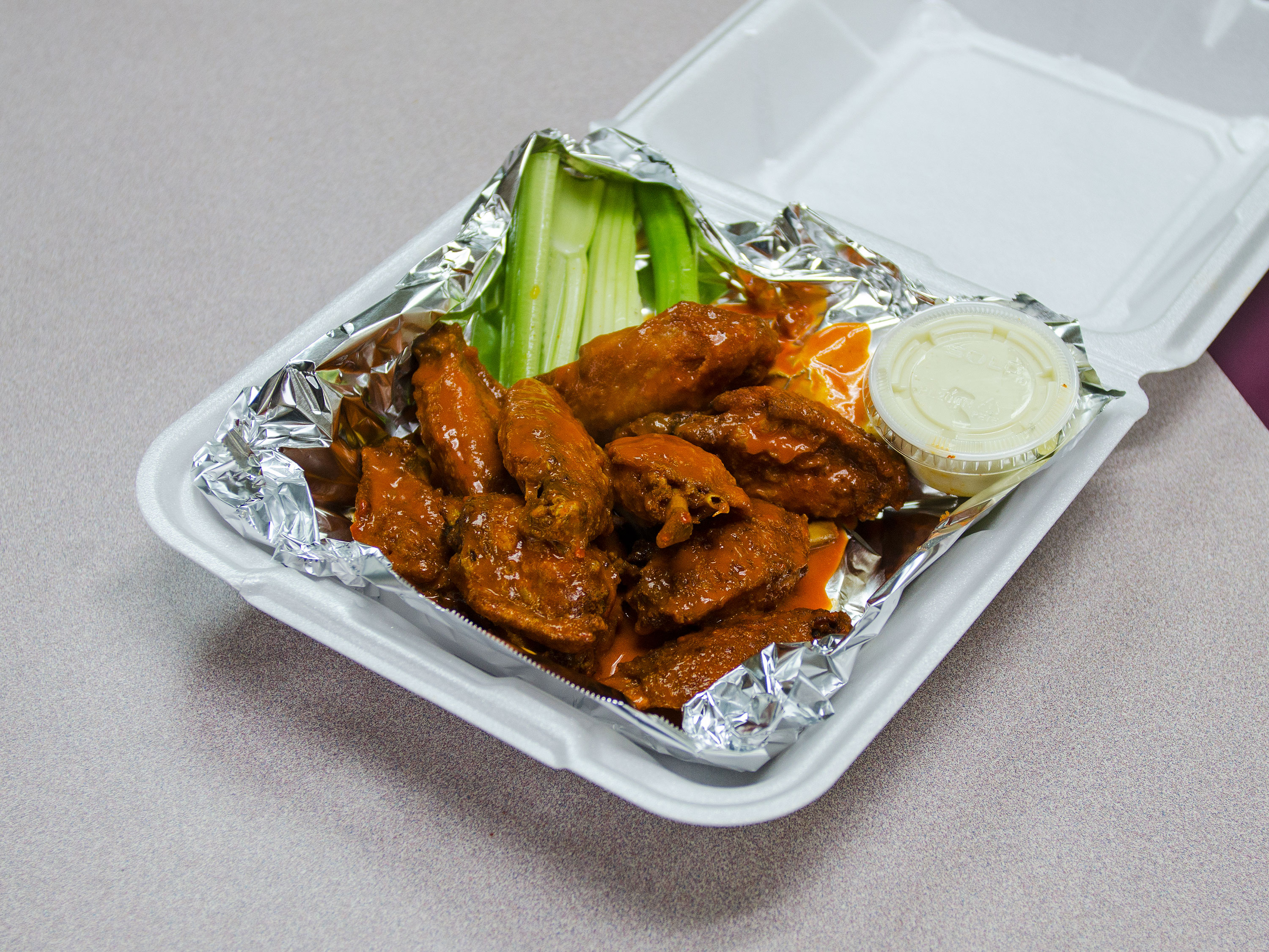 Order Wings food online from Toscana Pizzeria store, Audubon on bringmethat.com