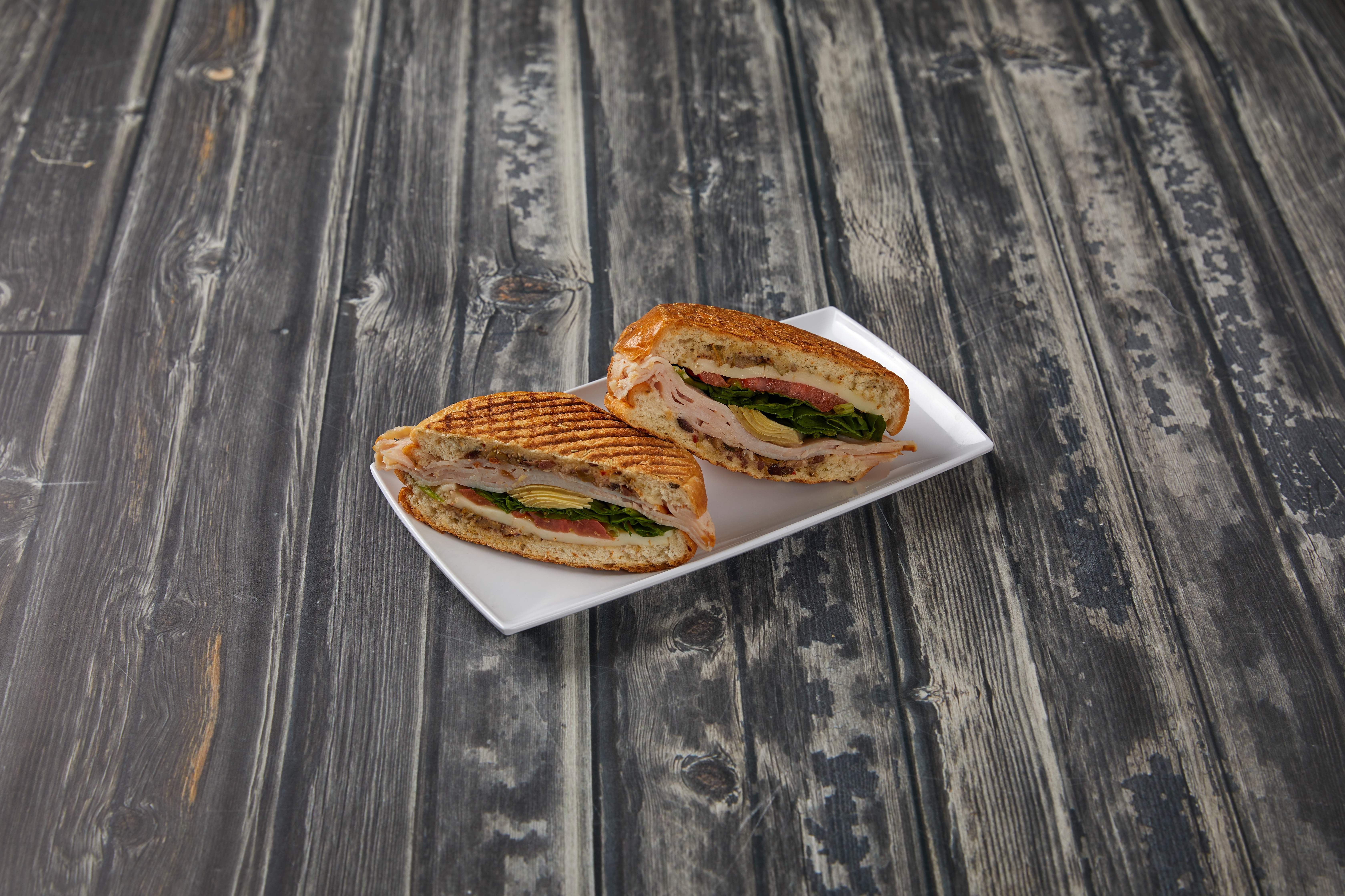 Order Turkey Panini Sandwich food online from Aroma Cafe store, Oakland on bringmethat.com