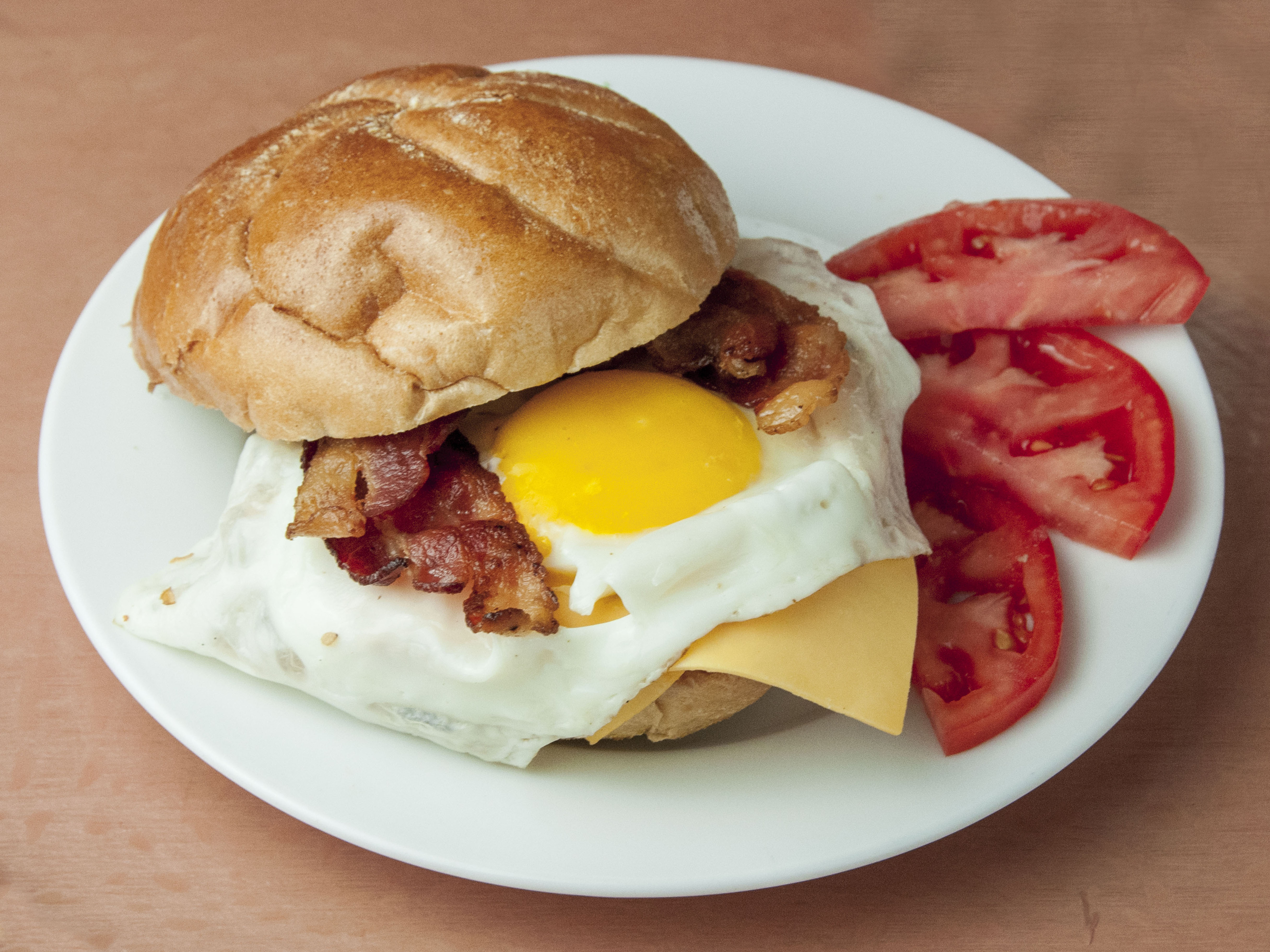 Order Bacon, Egg and Cheese Sandwich food online from Panini Grill store, New York on bringmethat.com