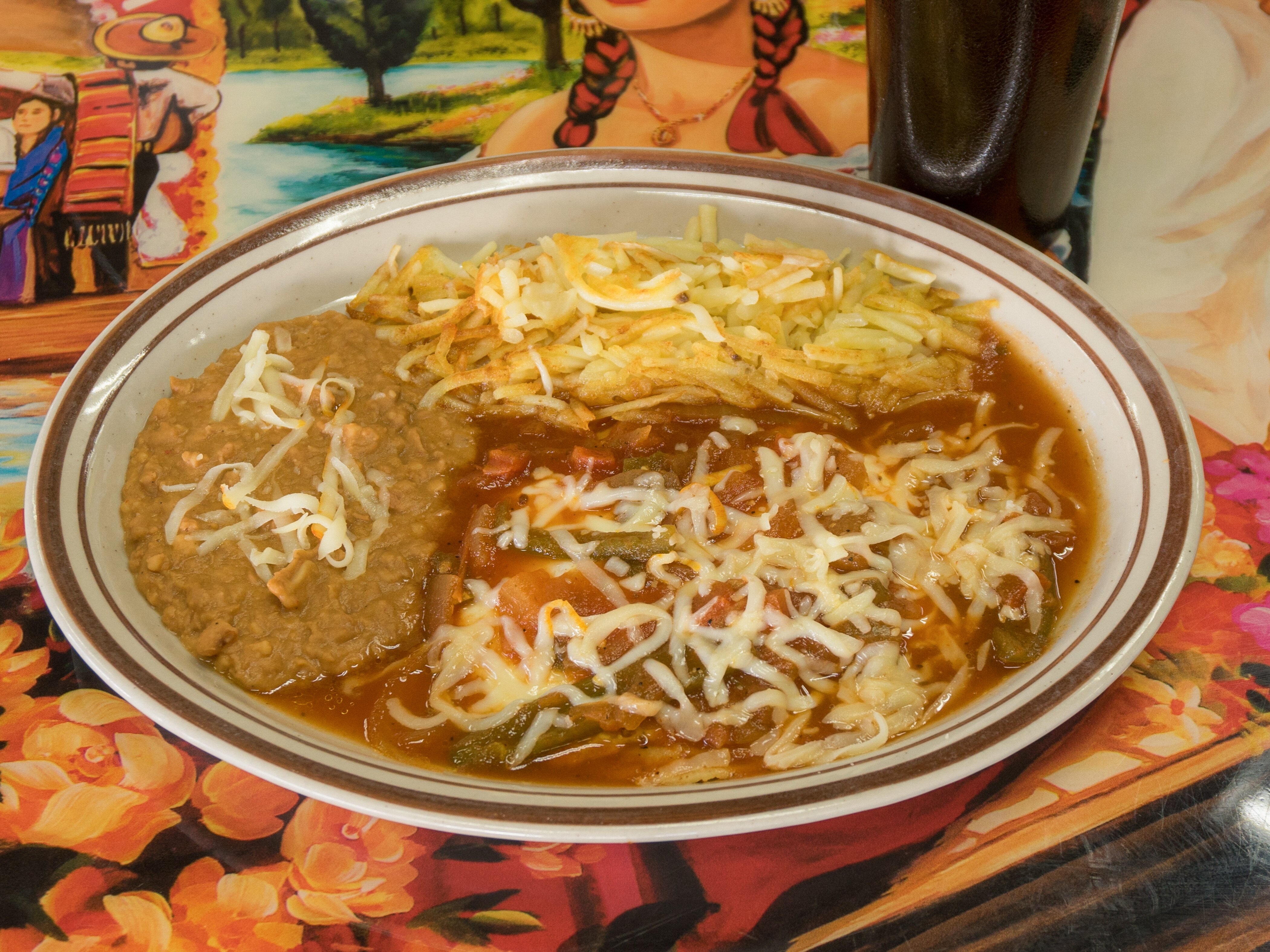 Order Huevos Rancheros food online from La Familia store, El Paso on bringmethat.com
