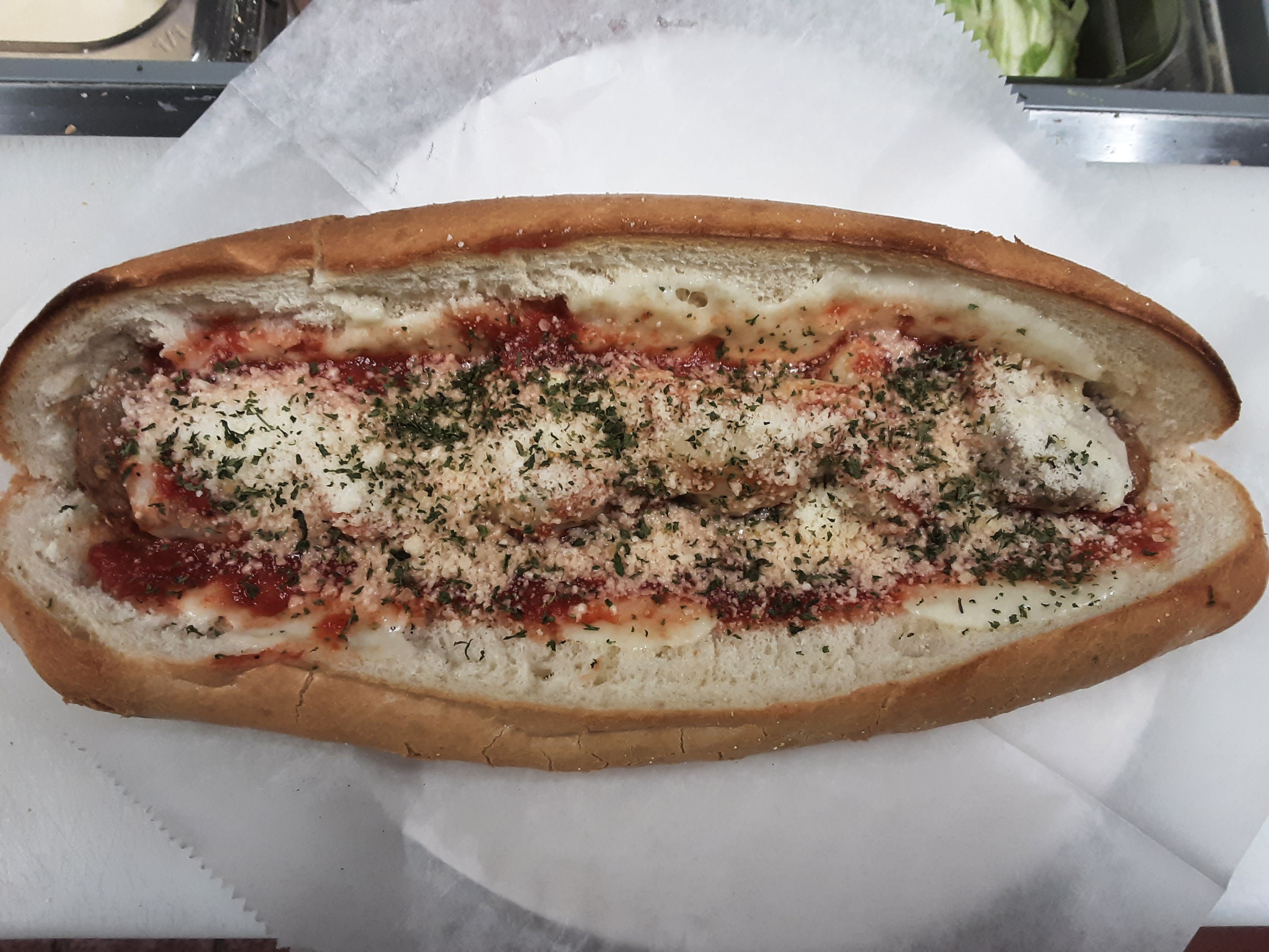 Order Meatball Parm Sandwich - Sandwich food online from Mingaliens Trattoria store, Natick on bringmethat.com