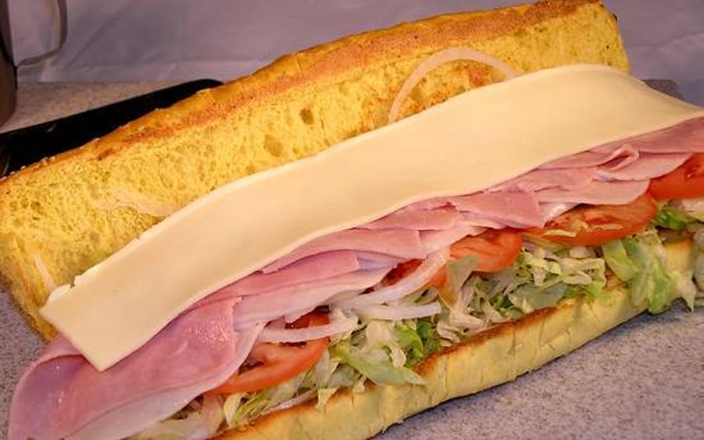 Order Turkey & Ham Sub - Half food online from Cal'z Pizza Subs and Chicken Wings store, Virginia Beach on bringmethat.com